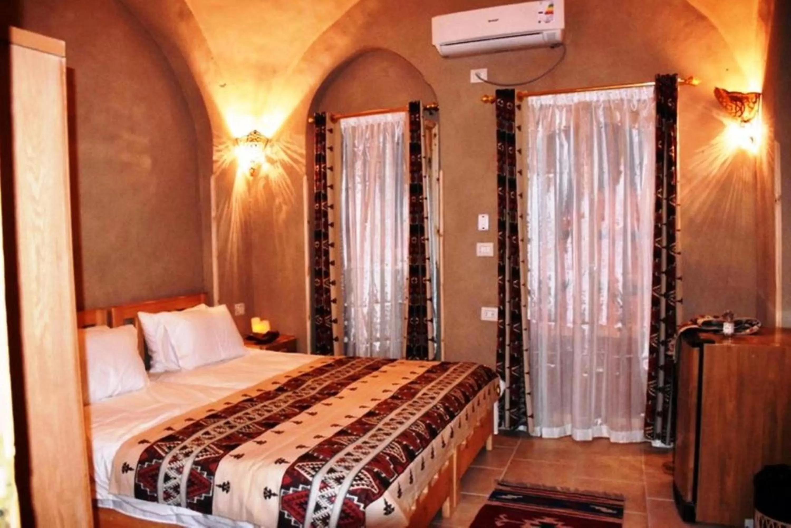 Bed in Embrace Hotel