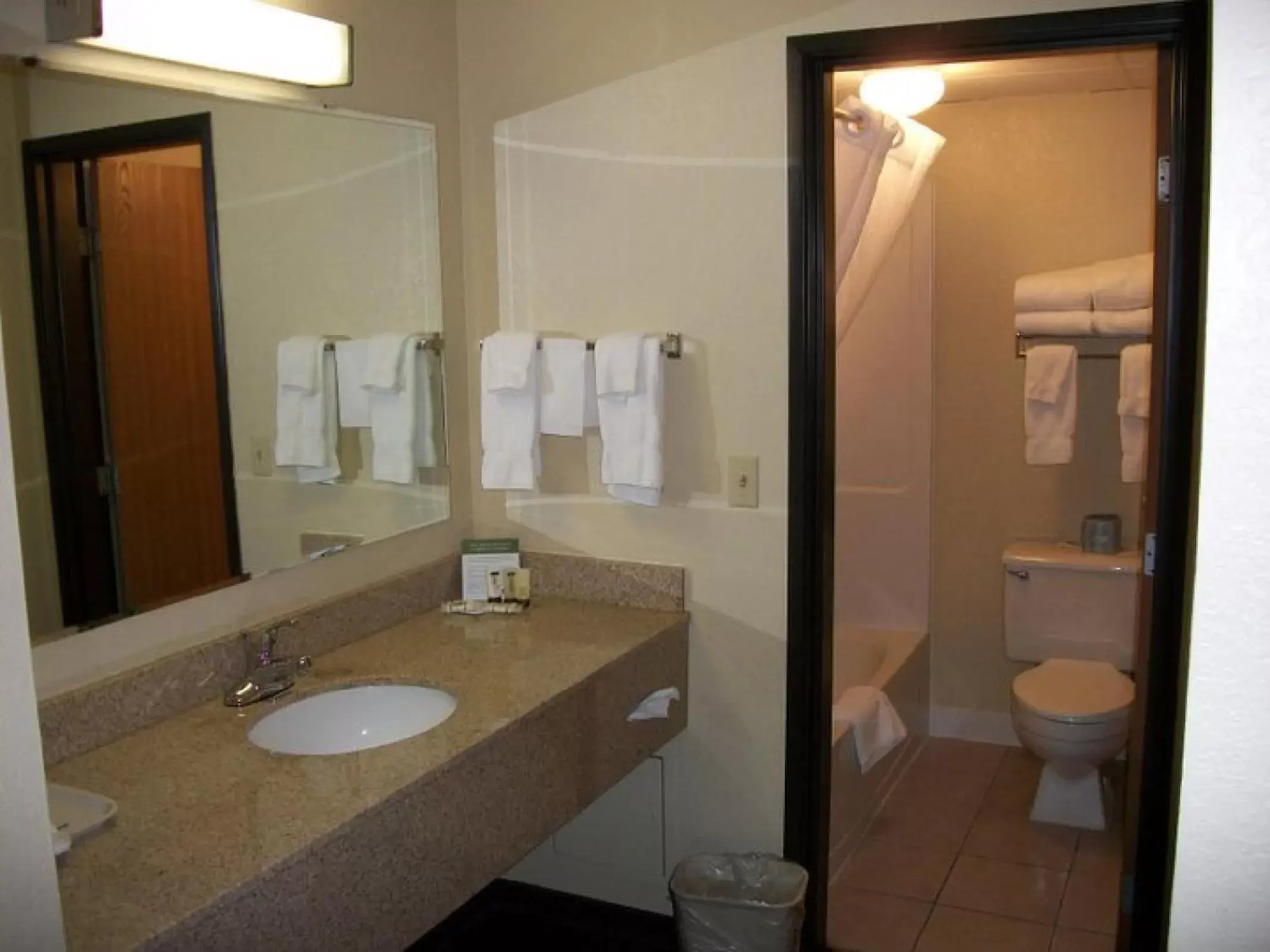 Bathroom in AmericInn by Wyndham Fargo West Acres