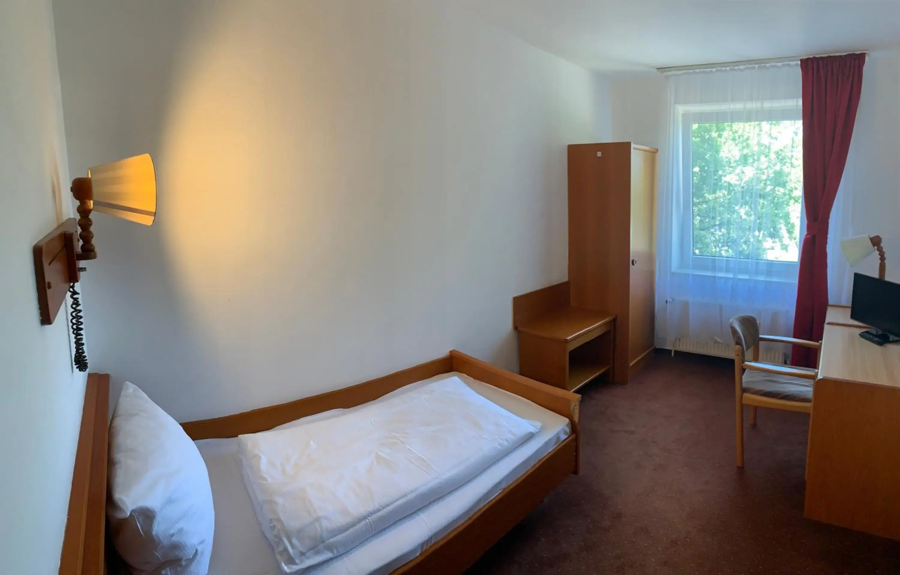 Photo of the whole room, Bed in Hotel Rahlstedter Hof
