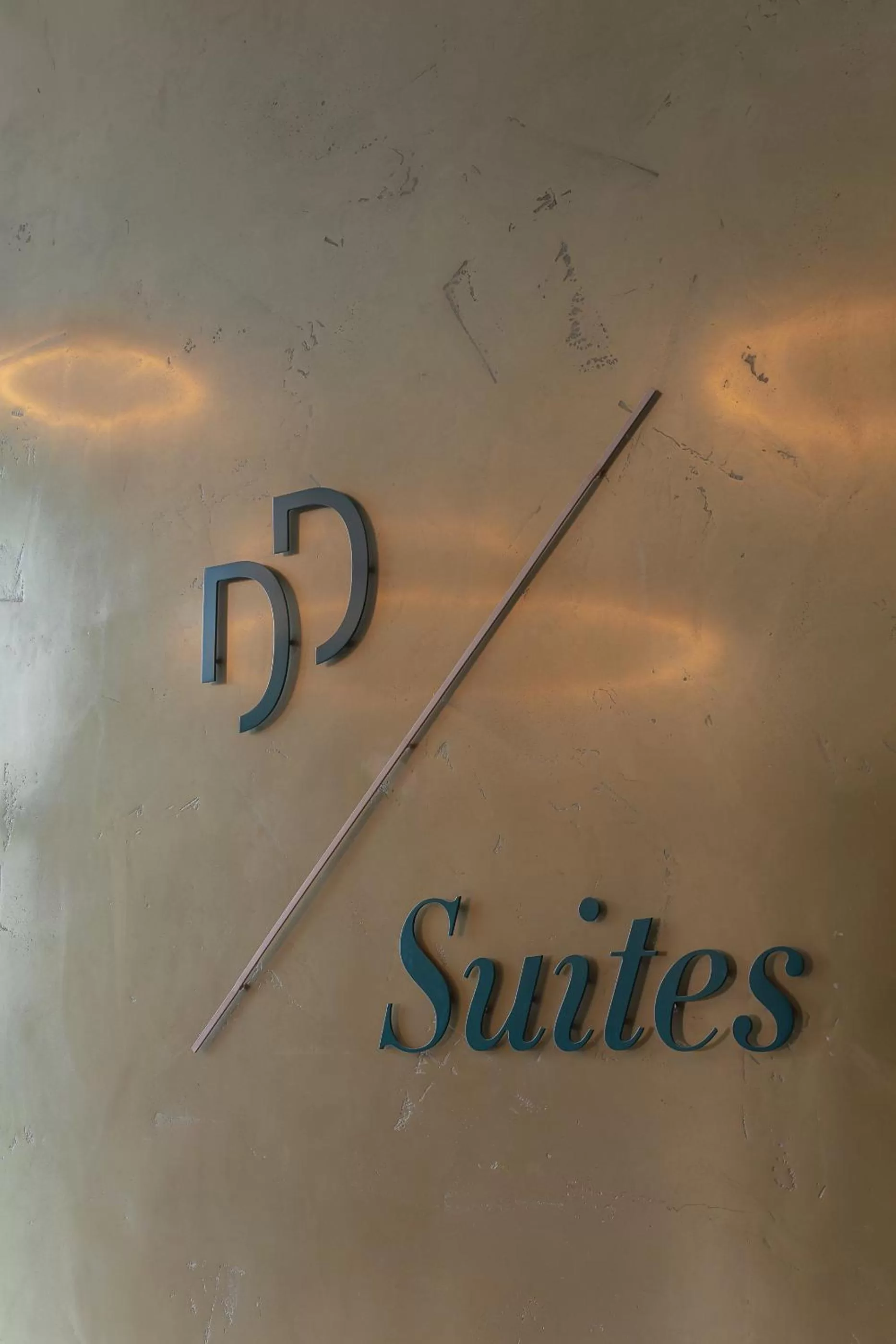 Property logo or sign in DD Suites Serviced Apartments