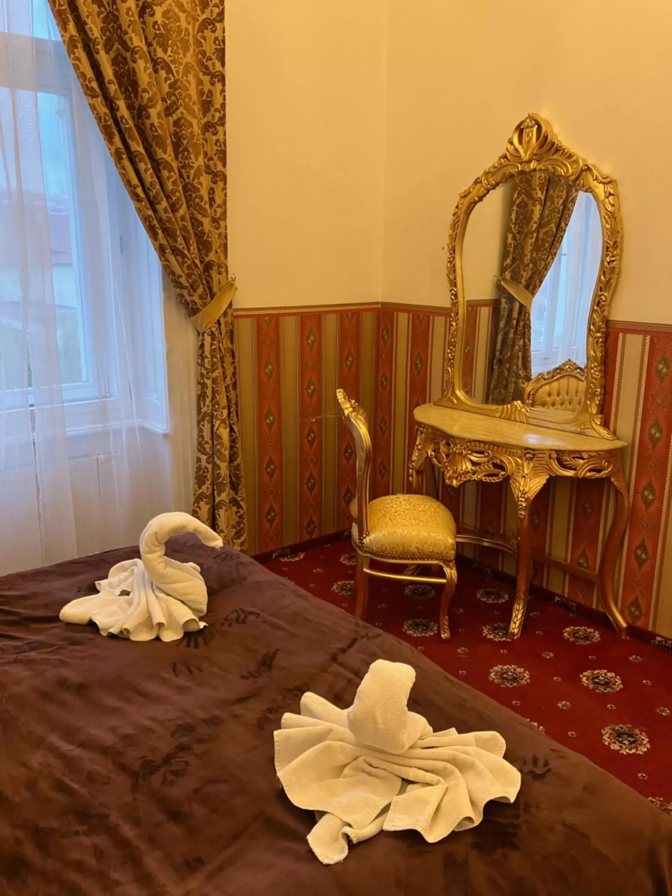 Bedroom, Seating Area in Hotel Klarinn Prague Castle
