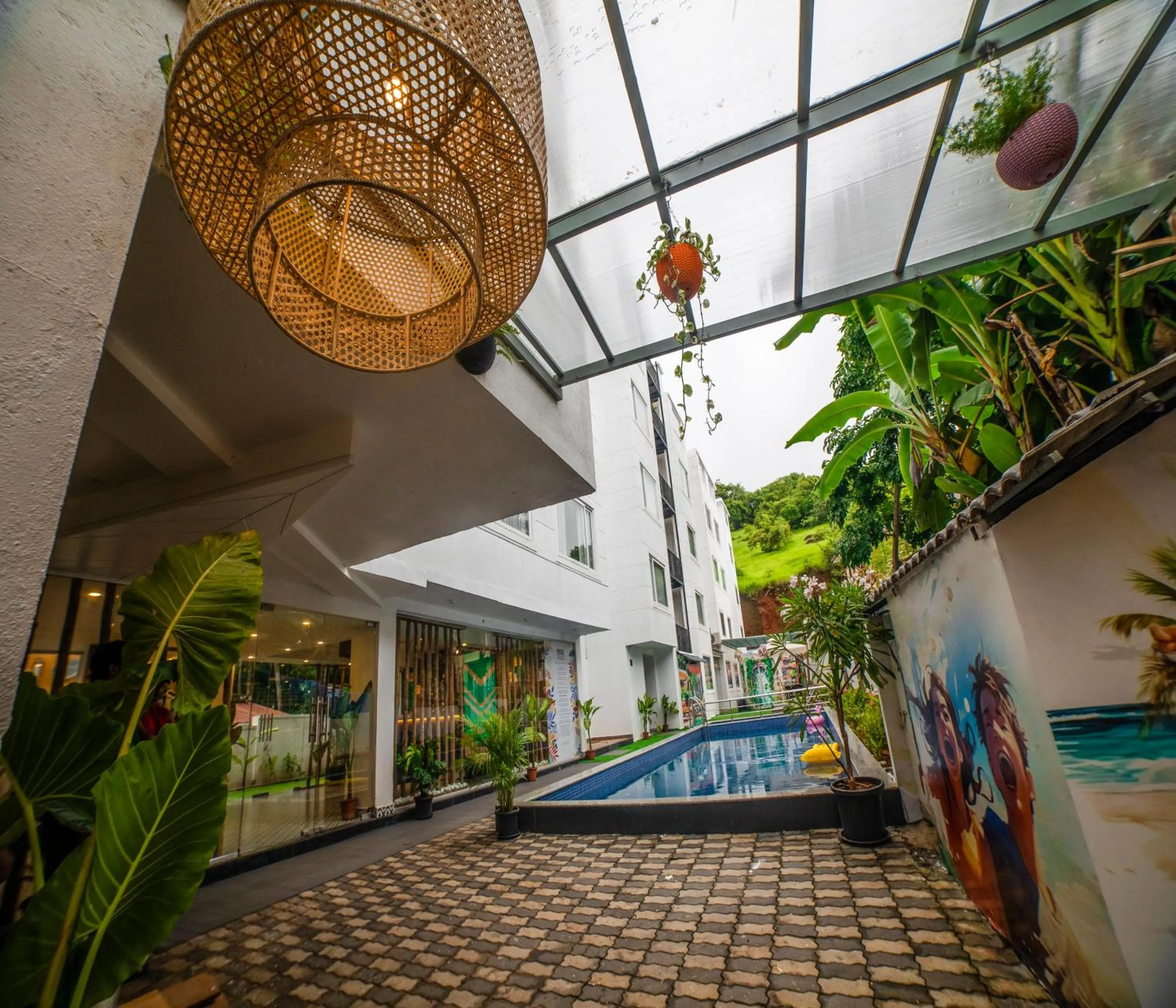 Swimming pool in HUE GUH The Porto Candolim