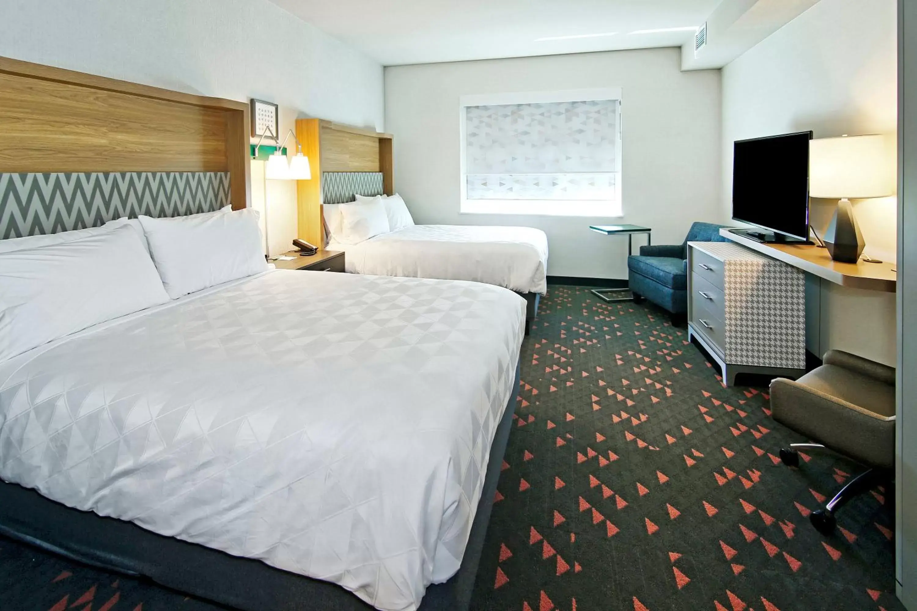 Photo of the whole room, Bed in Holiday Inn Hotel & Suites - Calgary Airport North, an IHG Hotel