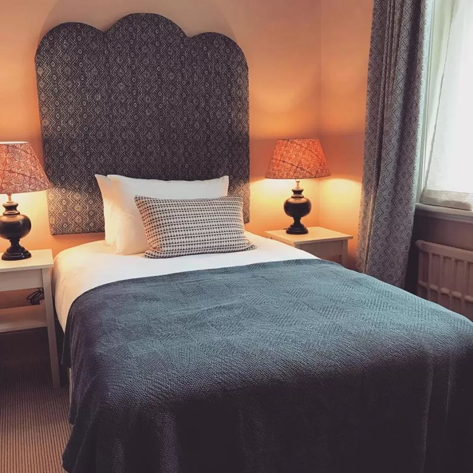 Bed in The Green Dragon Hotel