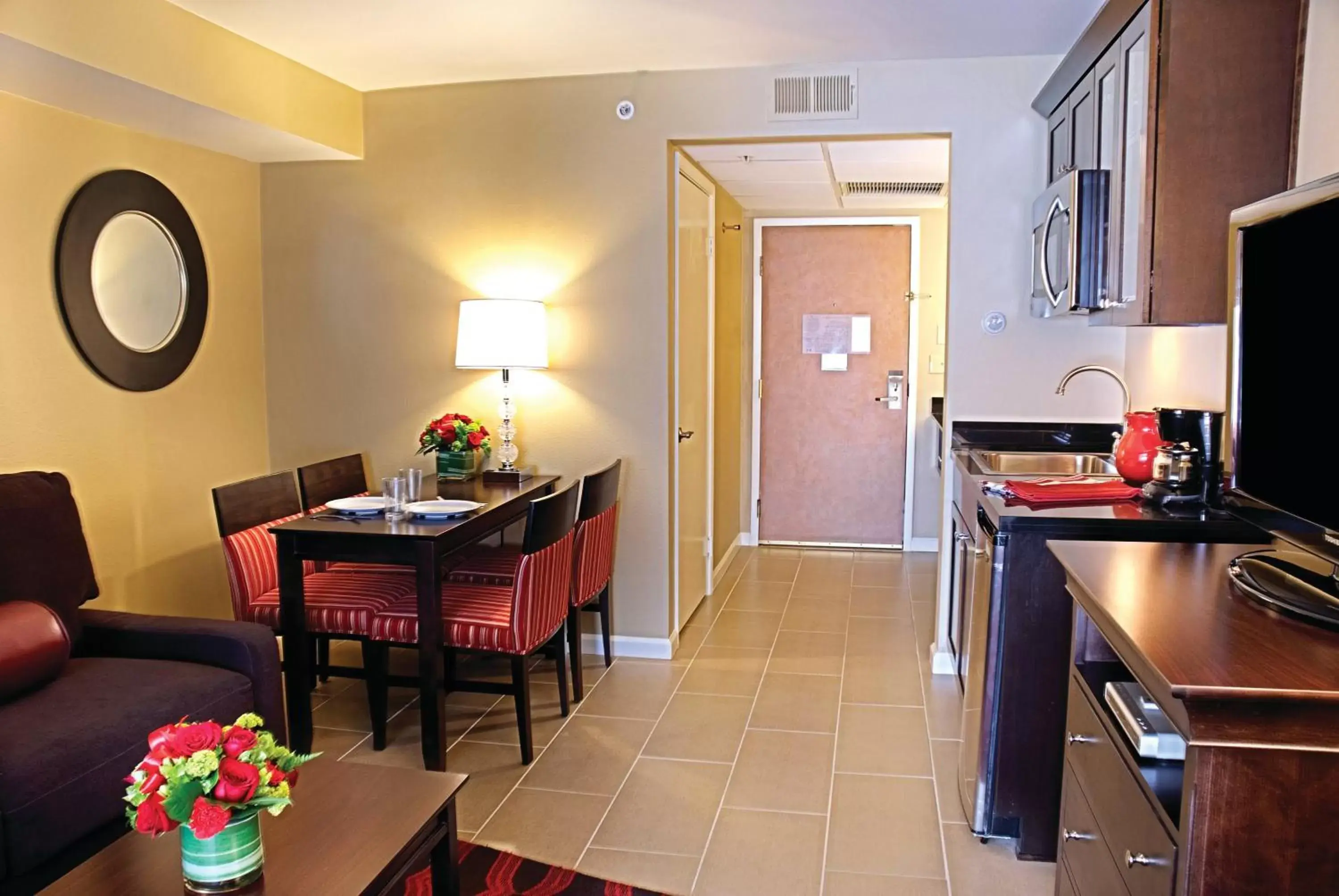 Bedroom, Dining Area in Peacock Suites