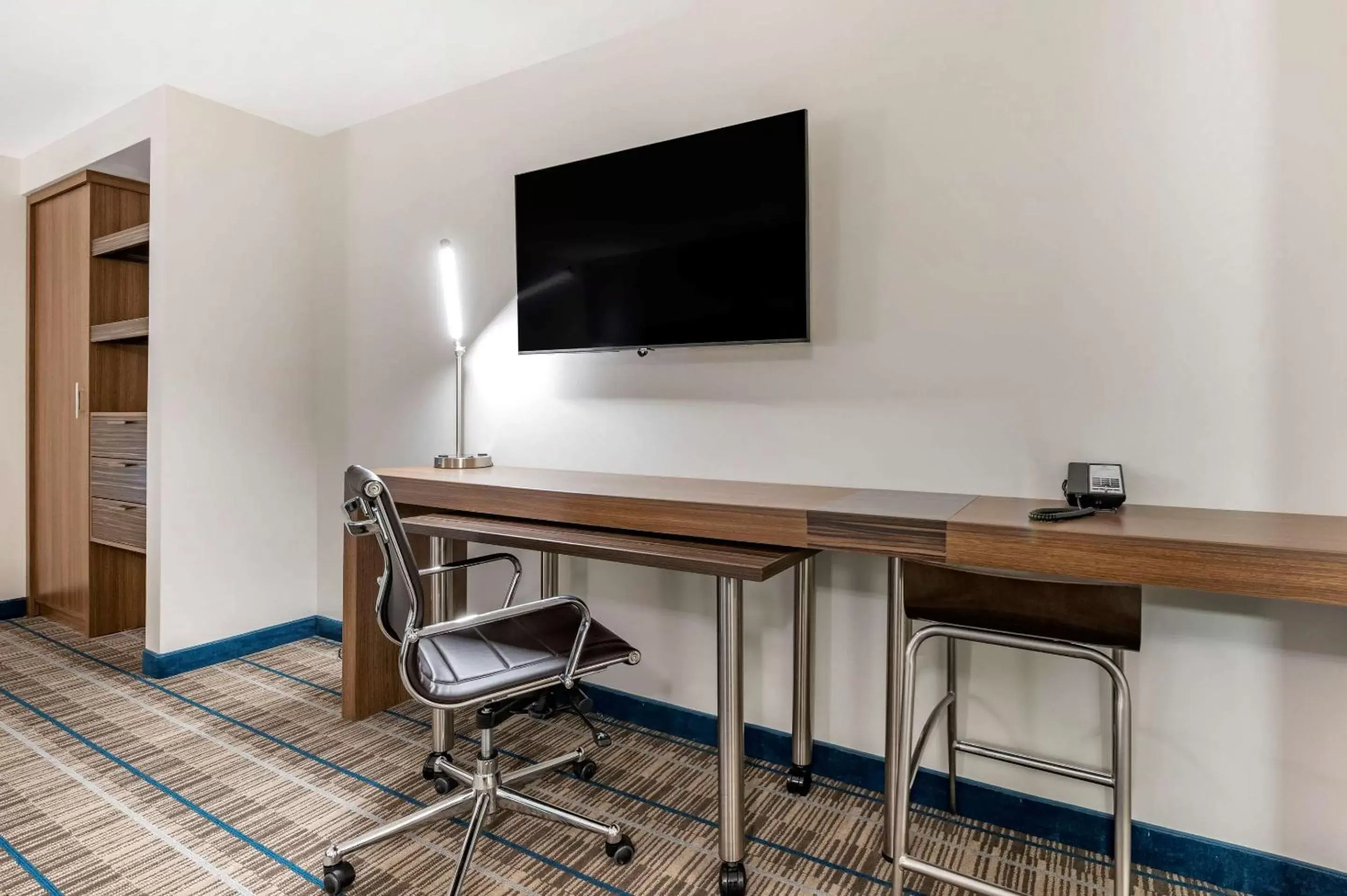 Photo of the whole room, TV/Entertainment Center in MainStay Suites