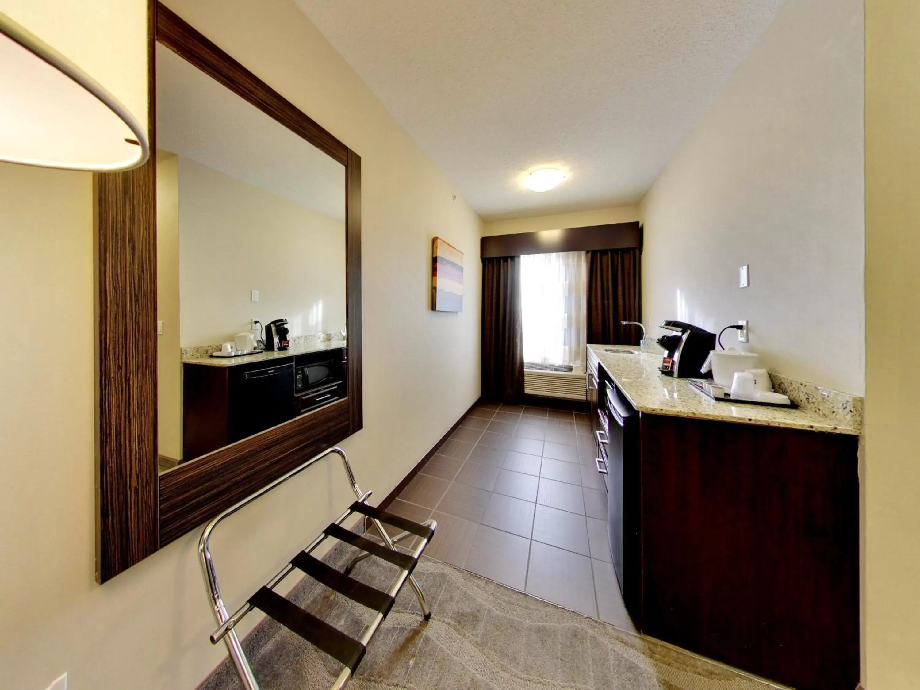 Photo of the whole room, Kitchen/Kitchenette in Holiday Inn Express Hotel & Suites - Edmonton International Airport, an IHG Hotel