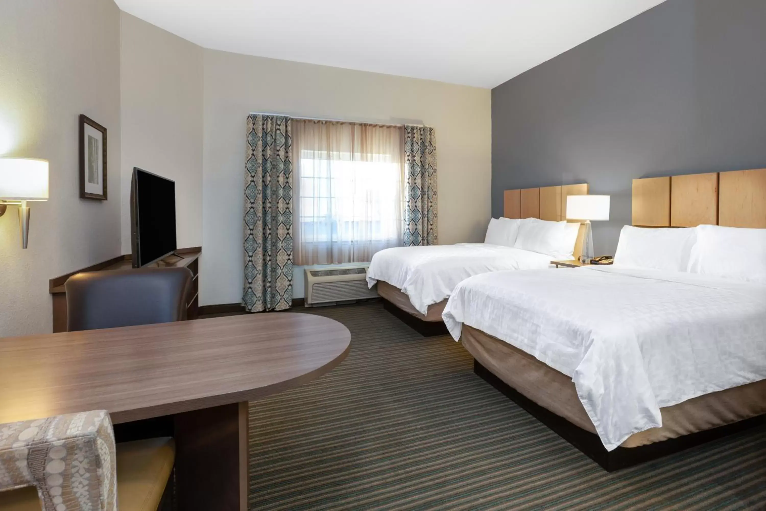 Bed in Candlewood Suites-West Springfield, an IHG Hotel