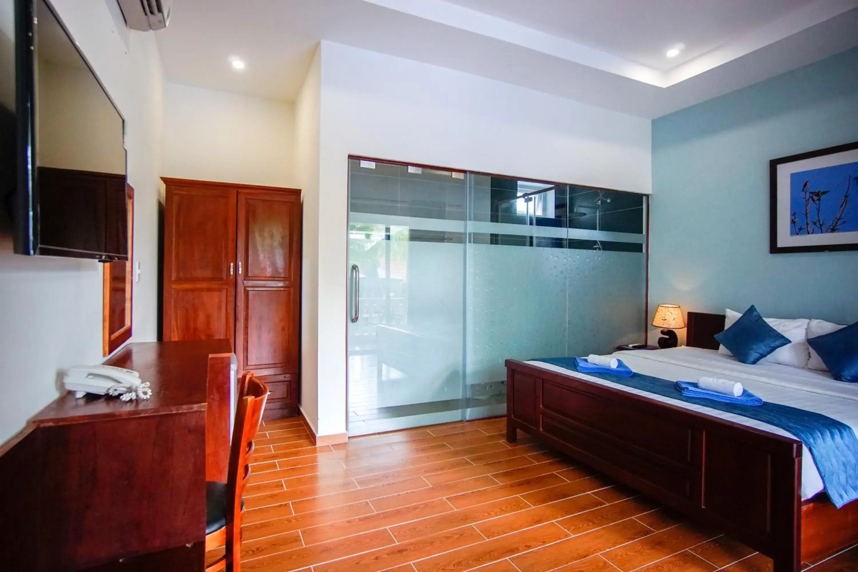 Communal lounge/ TV room, Bed in Brenta Phu Quoc Hotel