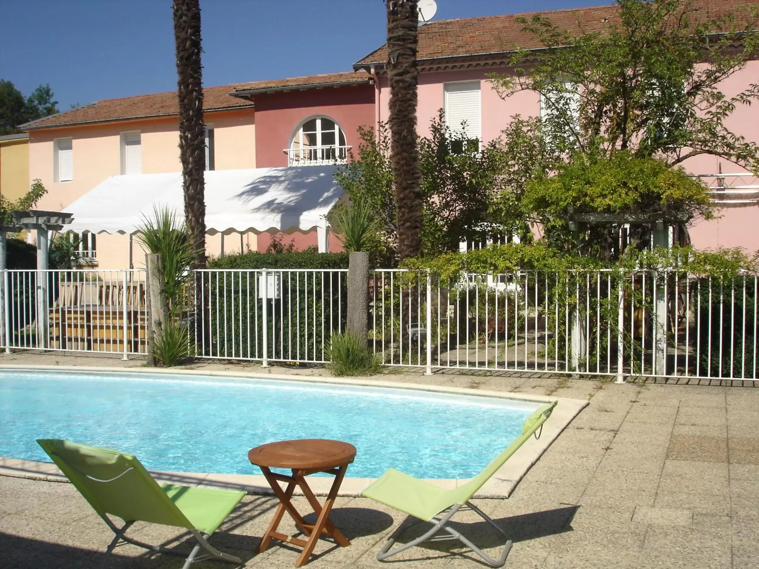 Swimming Pool in Hôtel Castel d'Olmes