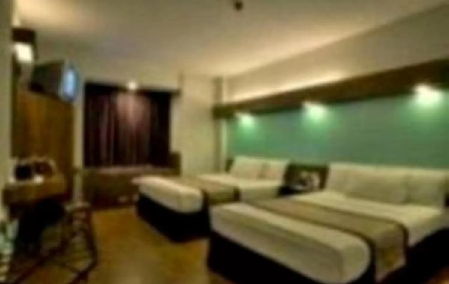 Bed in Microtel by Wyndham Baguio