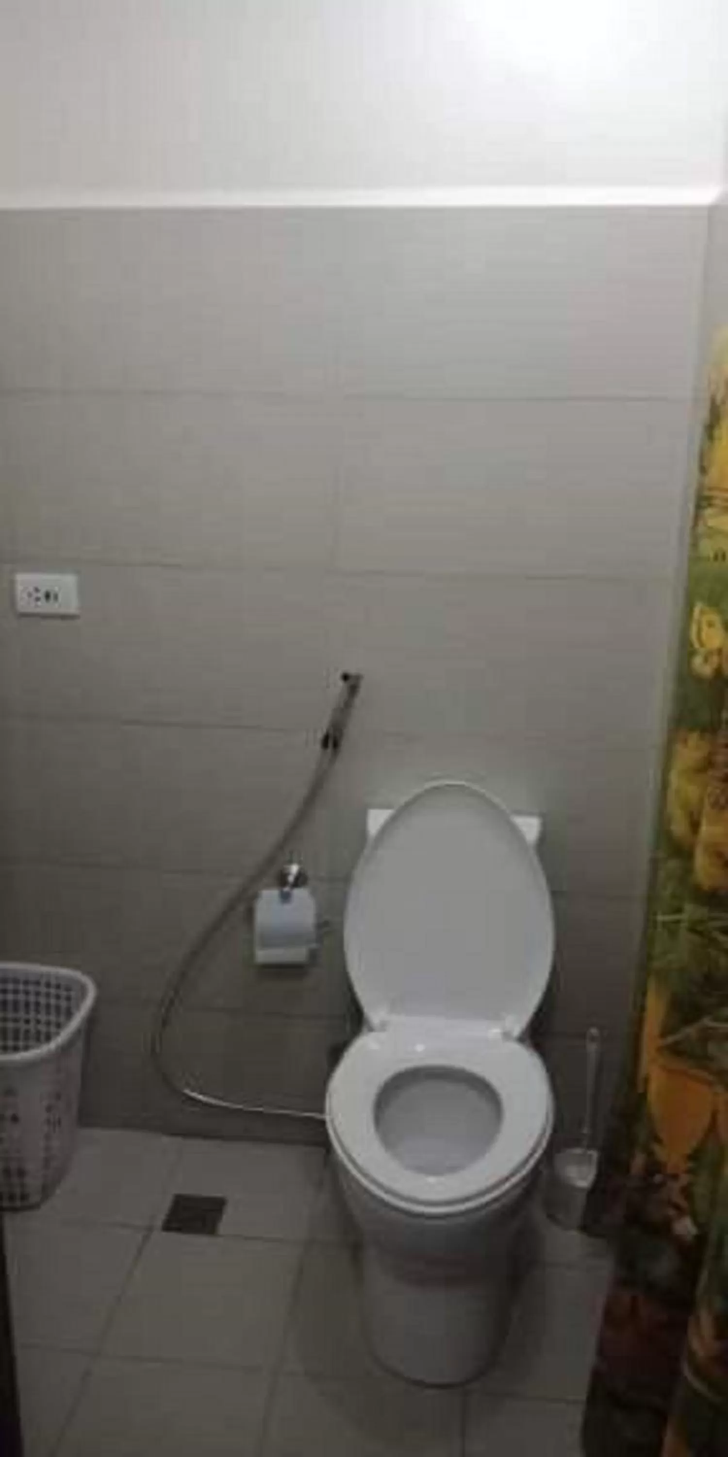 Toilet in Green Residences Stays by PBYY