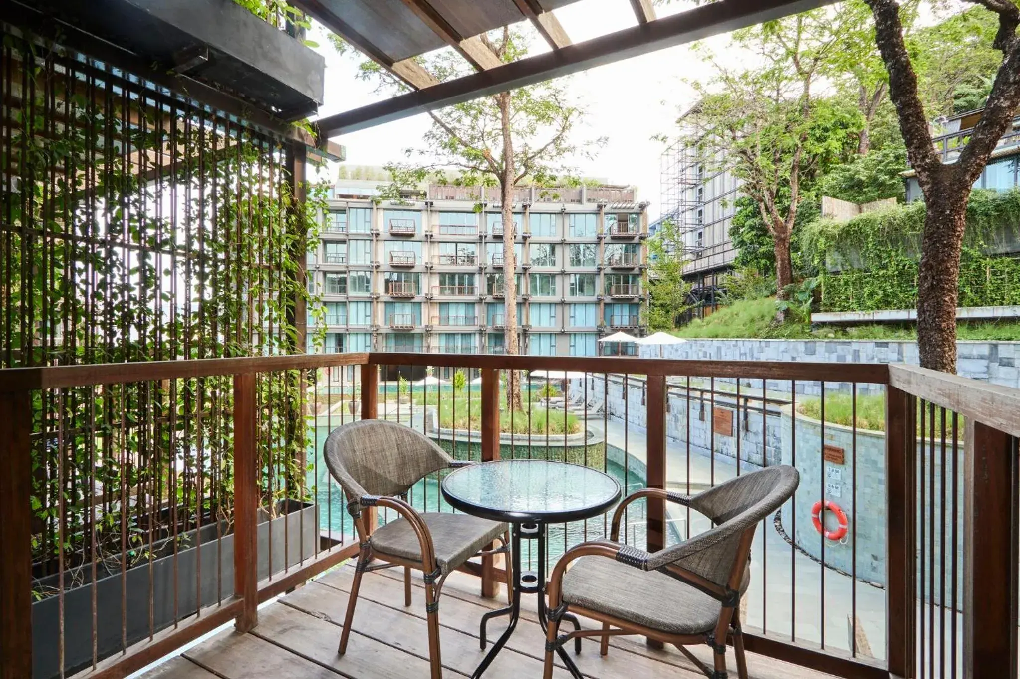 Photo of the whole room, Balcony/Terrace in Dinso Resort & Villas Phuket an IHG Hotel