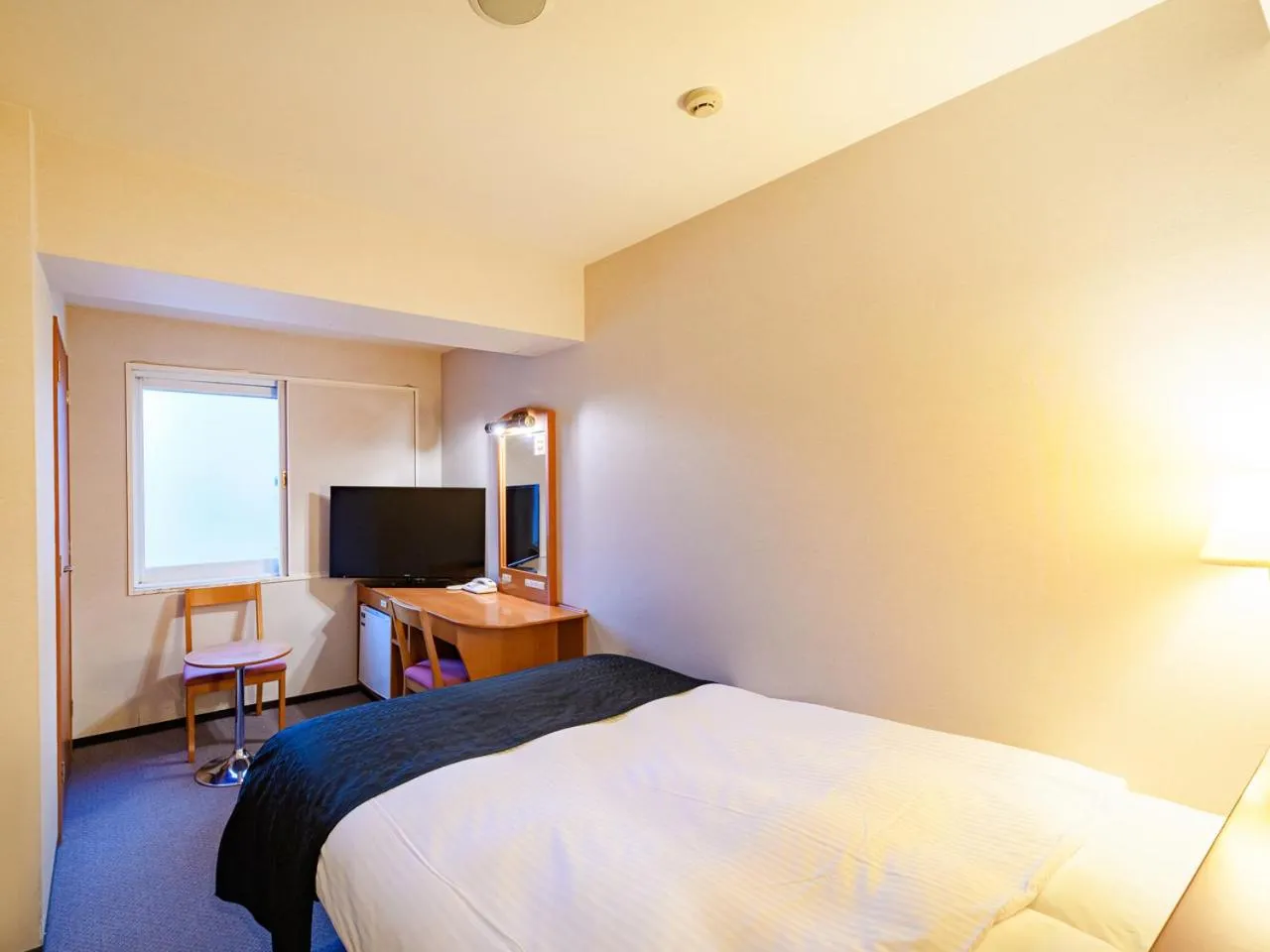 Photo of the whole room, Bed in APA Hotel Sapporo Odori Ekimae Minami