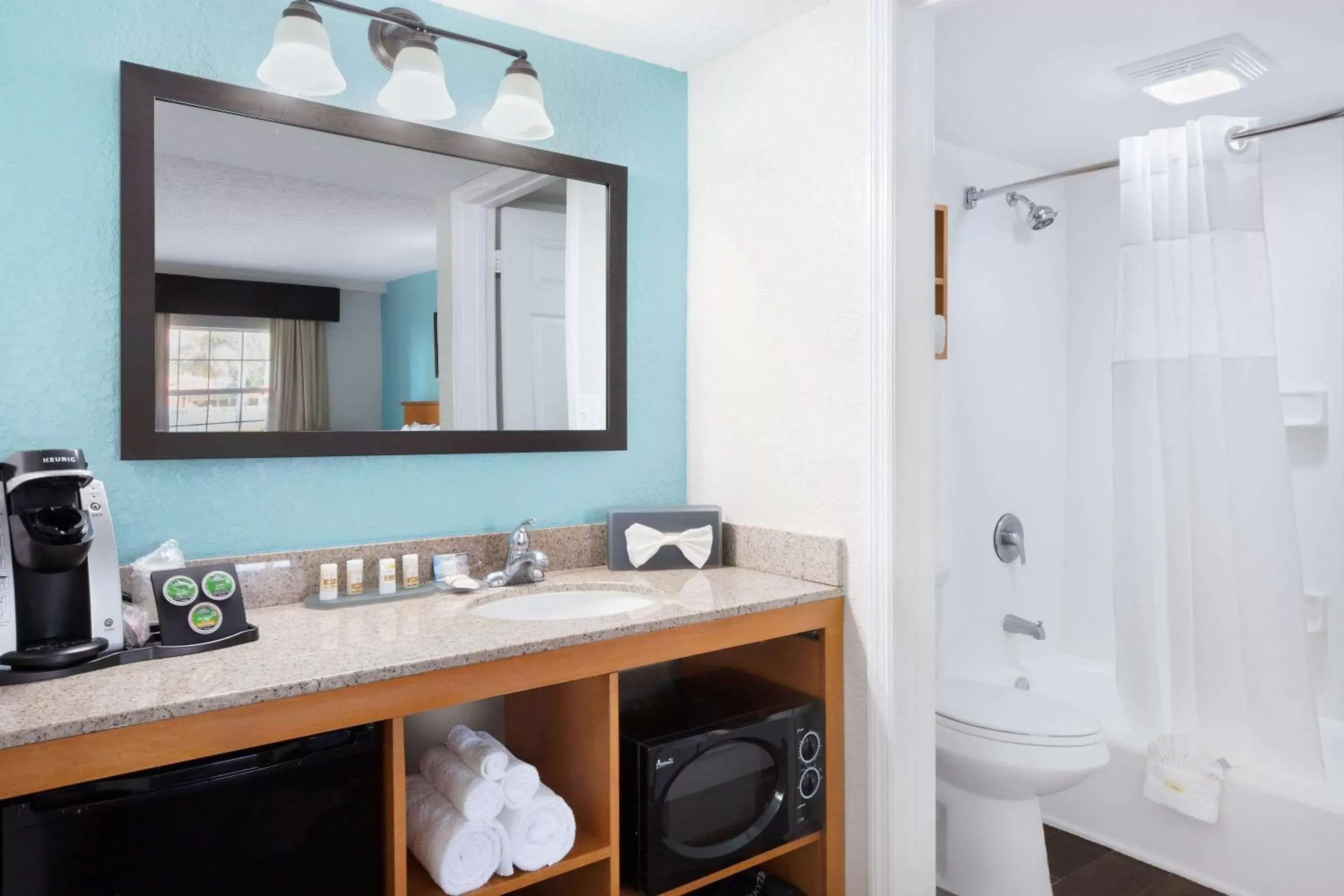 Photo of the whole room, Bathroom in La Quinta Inn by Wyndham Cocoa Beach-Port Canaveral