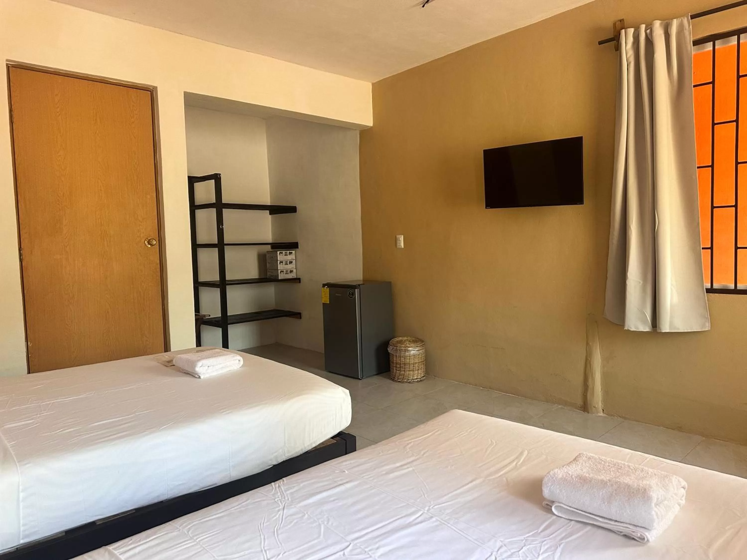 Bed in Hotel Bacalar Sunshine