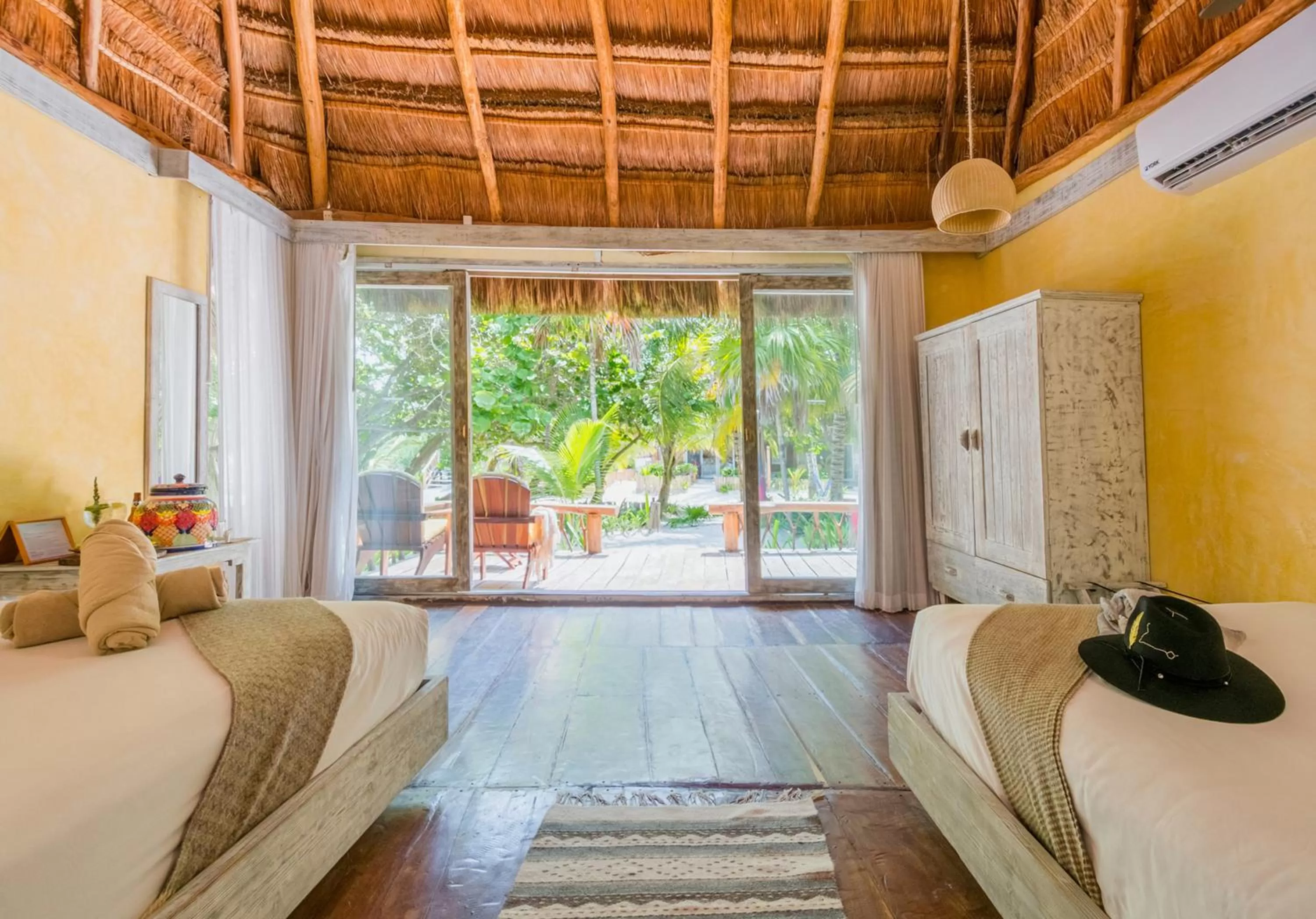 Bedroom, Bed in Villa Pescadores Tulum-Beachfront hotel by Ahau Collection