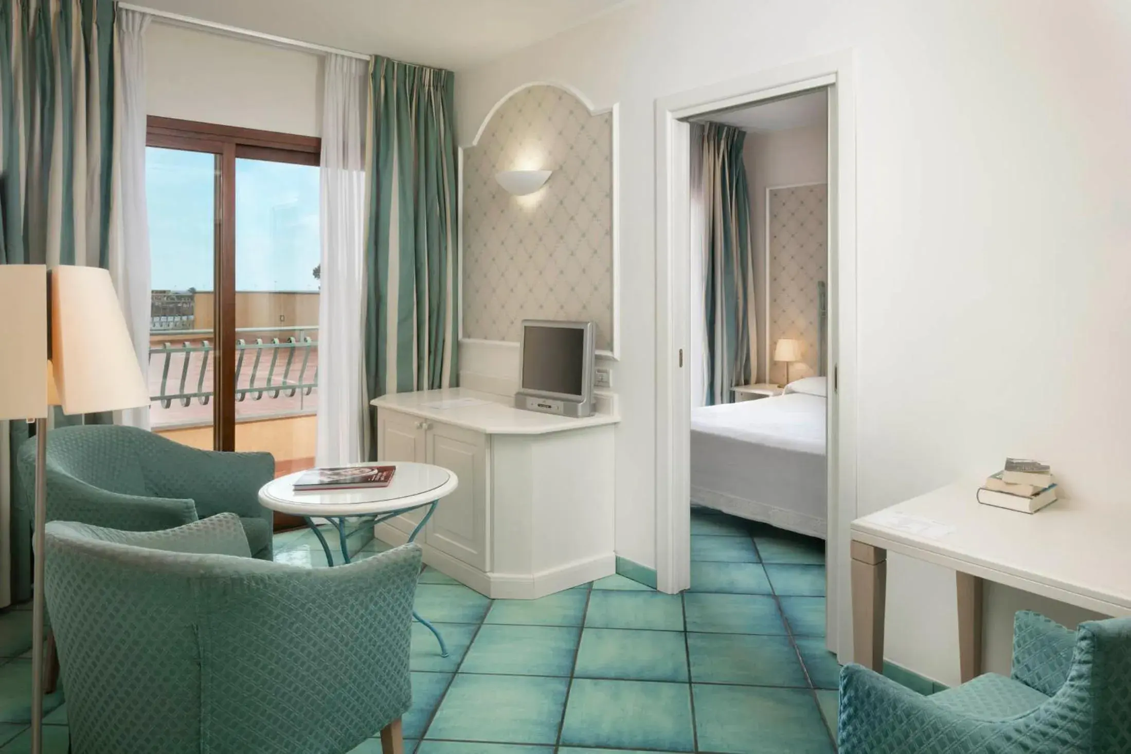 Living room, Bed in Hotel Santa Gilla Living room, Bed in Hotel Santa Gilla