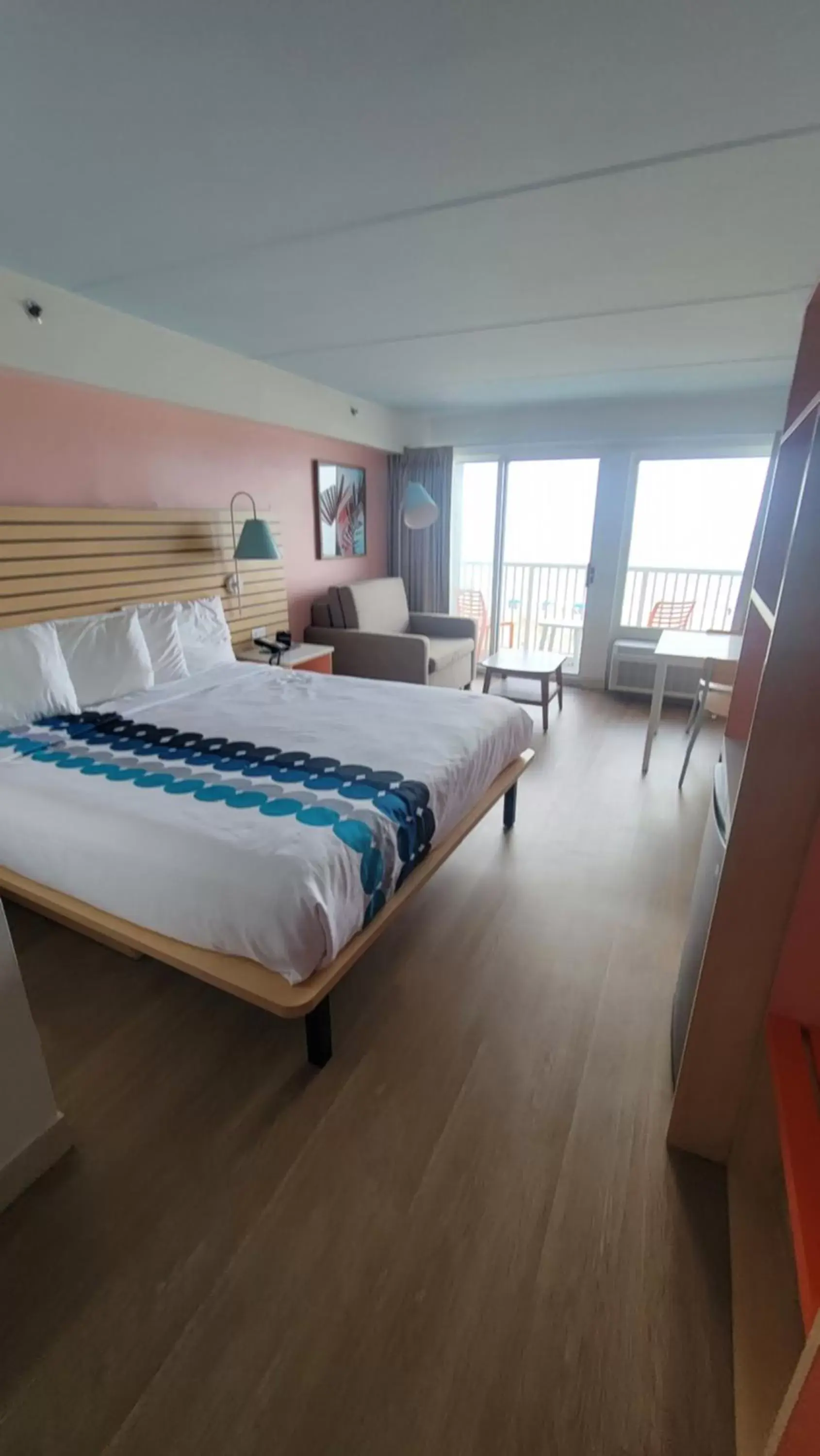 Bed in Golden Sands Oceanfront Hotel