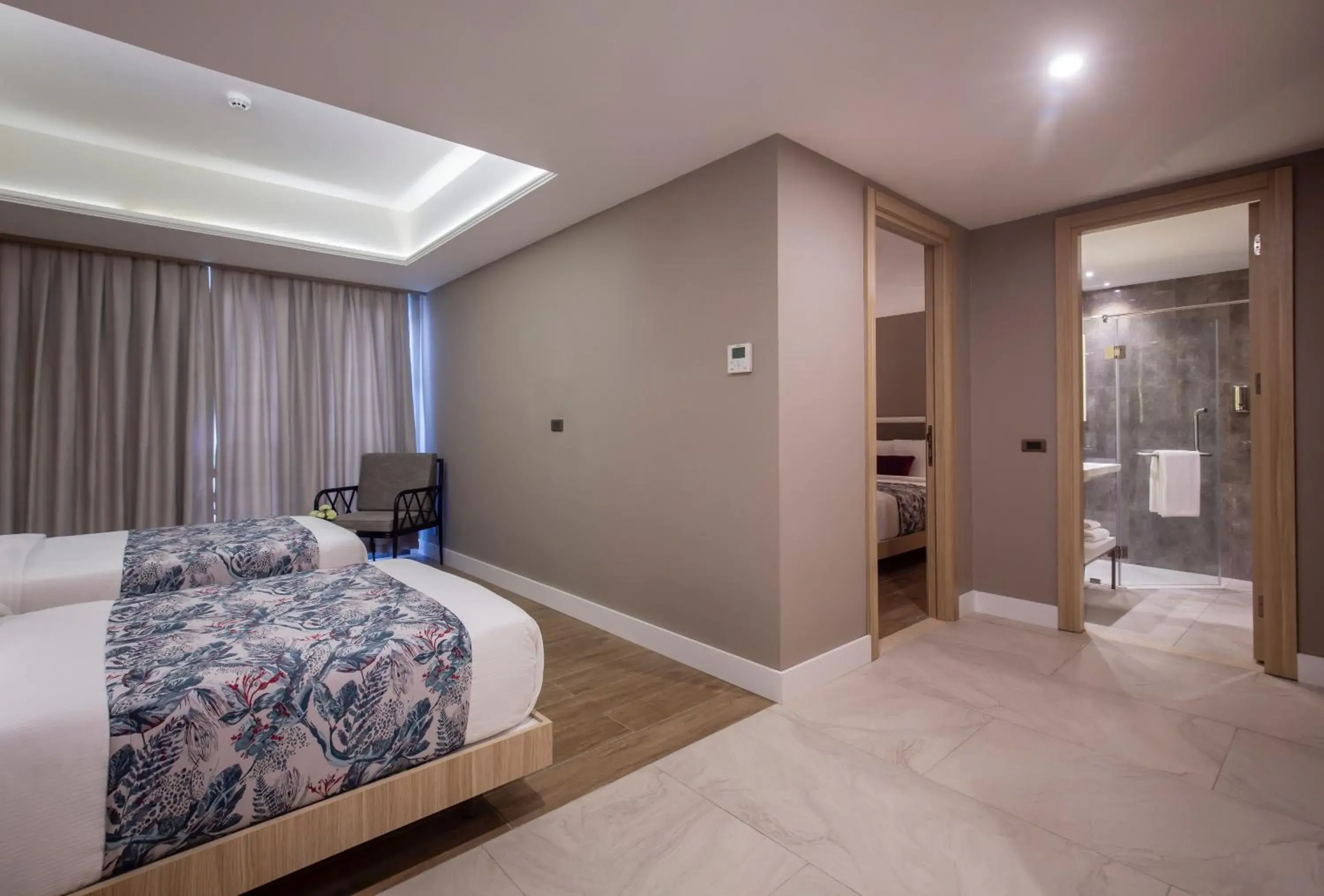 Photo of the whole room, Bed in Woovo Phuket Patong - SHA Extra Plus