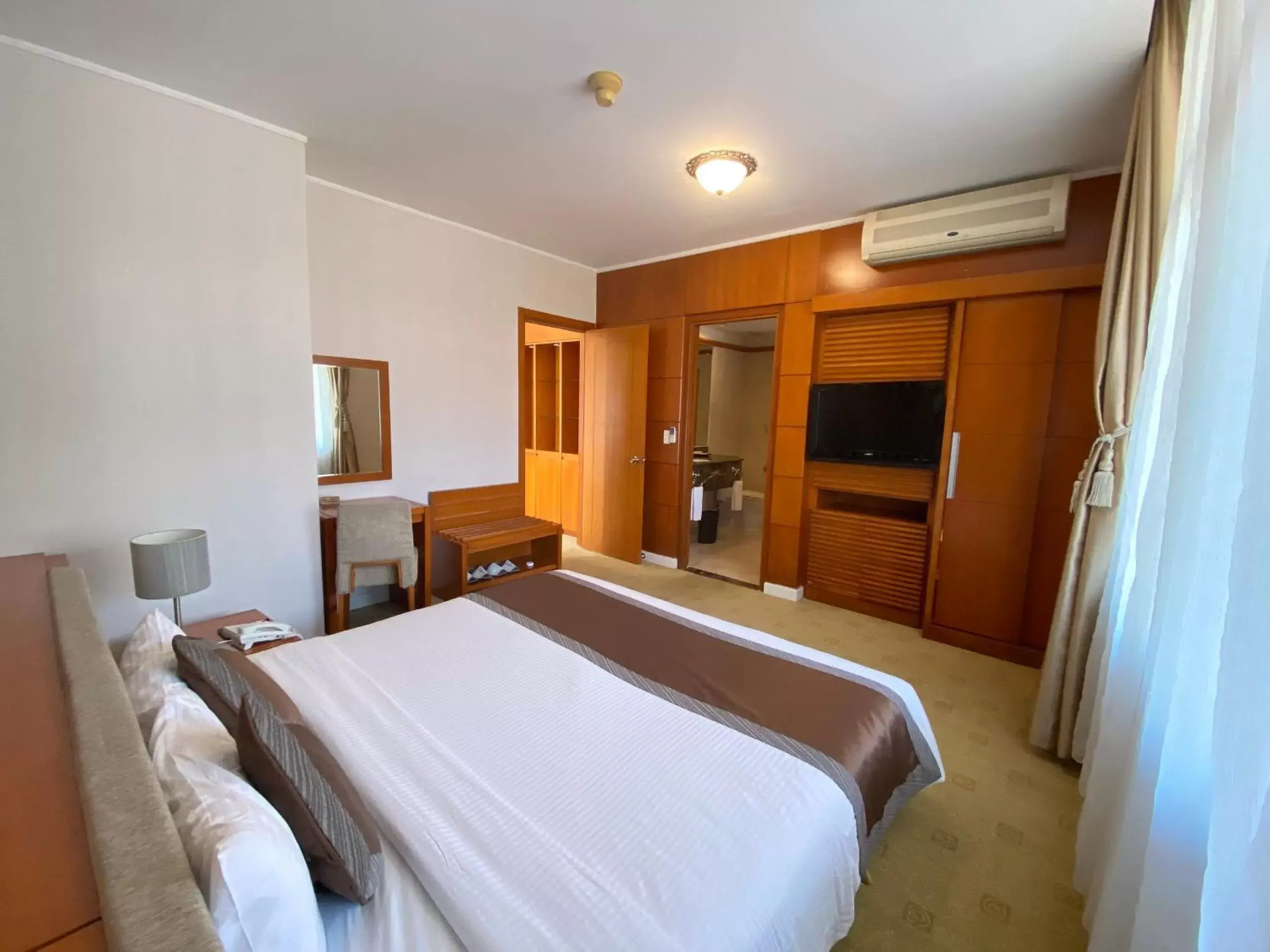 Bed in Muong Thanh Holiday Da Lat Hotel