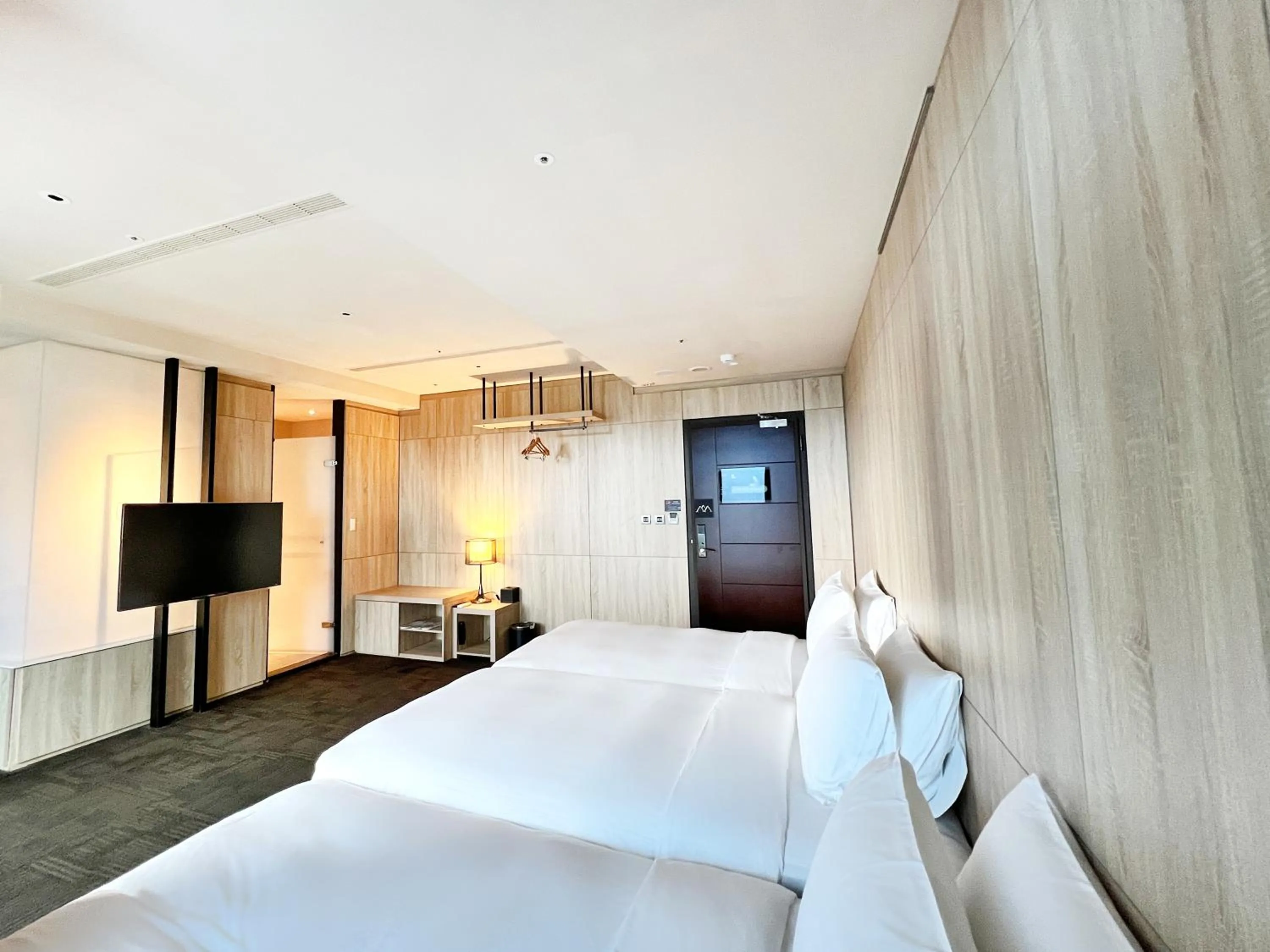 Bedroom in Wallsun Hotel