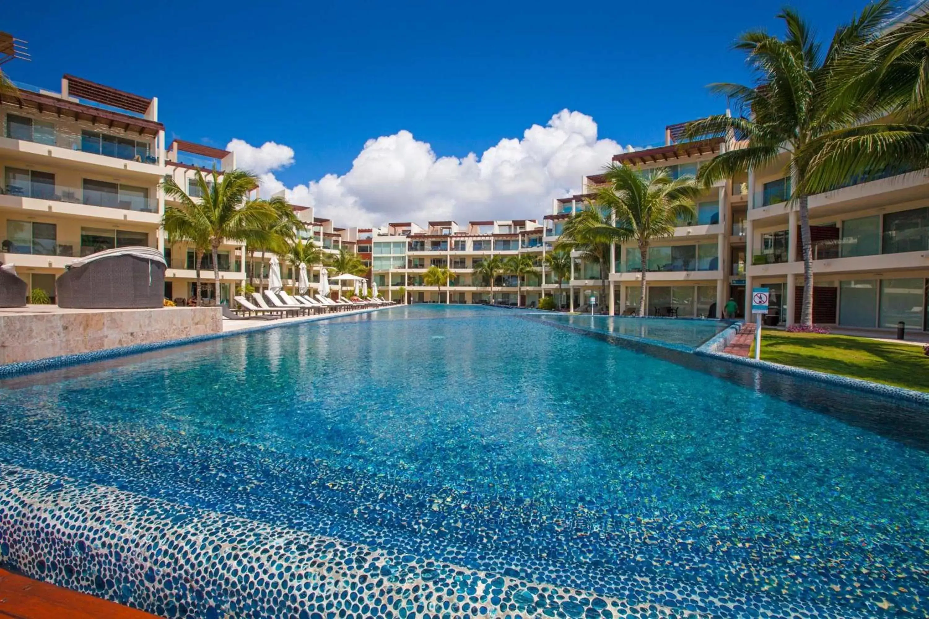 Swimming Pool in The Elements Oceanfront & Beachside Condo Hotel