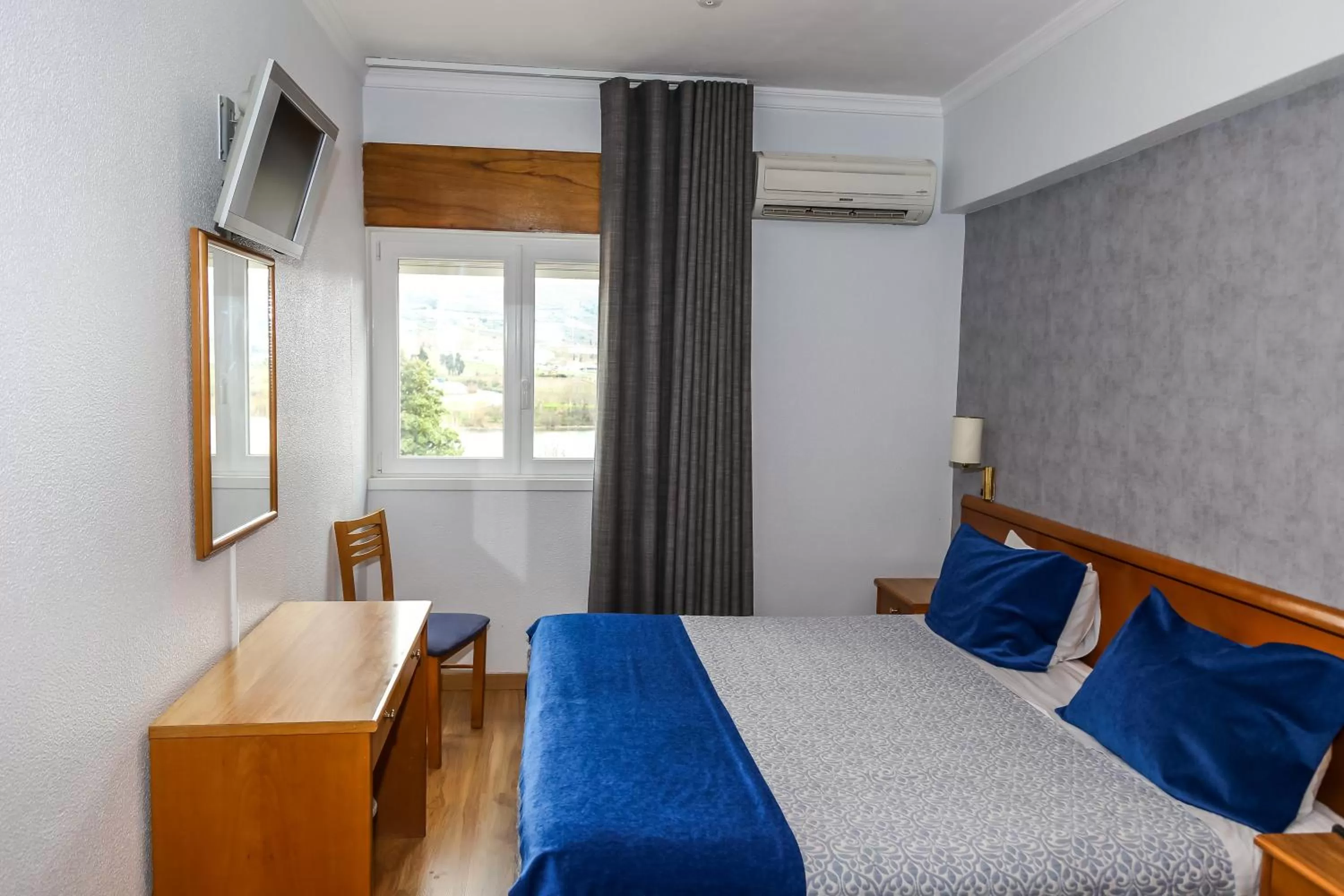 Bed in Hotel Columbano