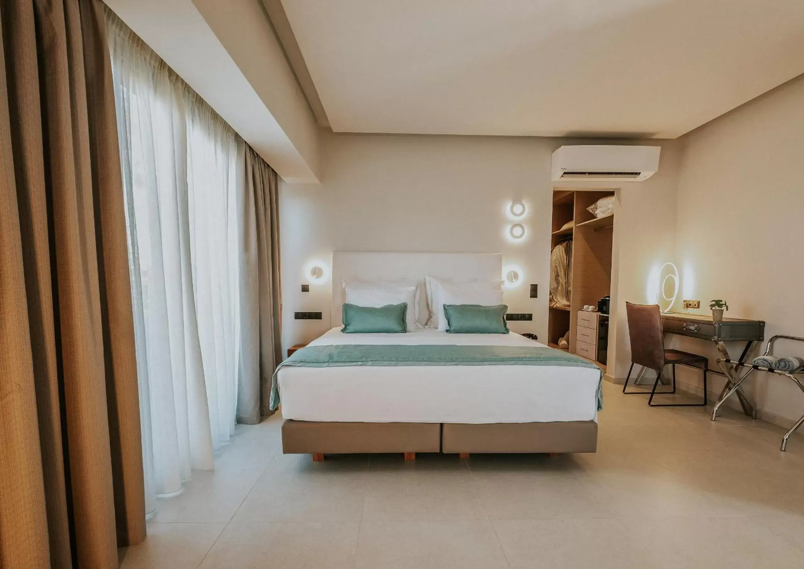 Bed in Pefkaki Boutique Hotel Loutraki