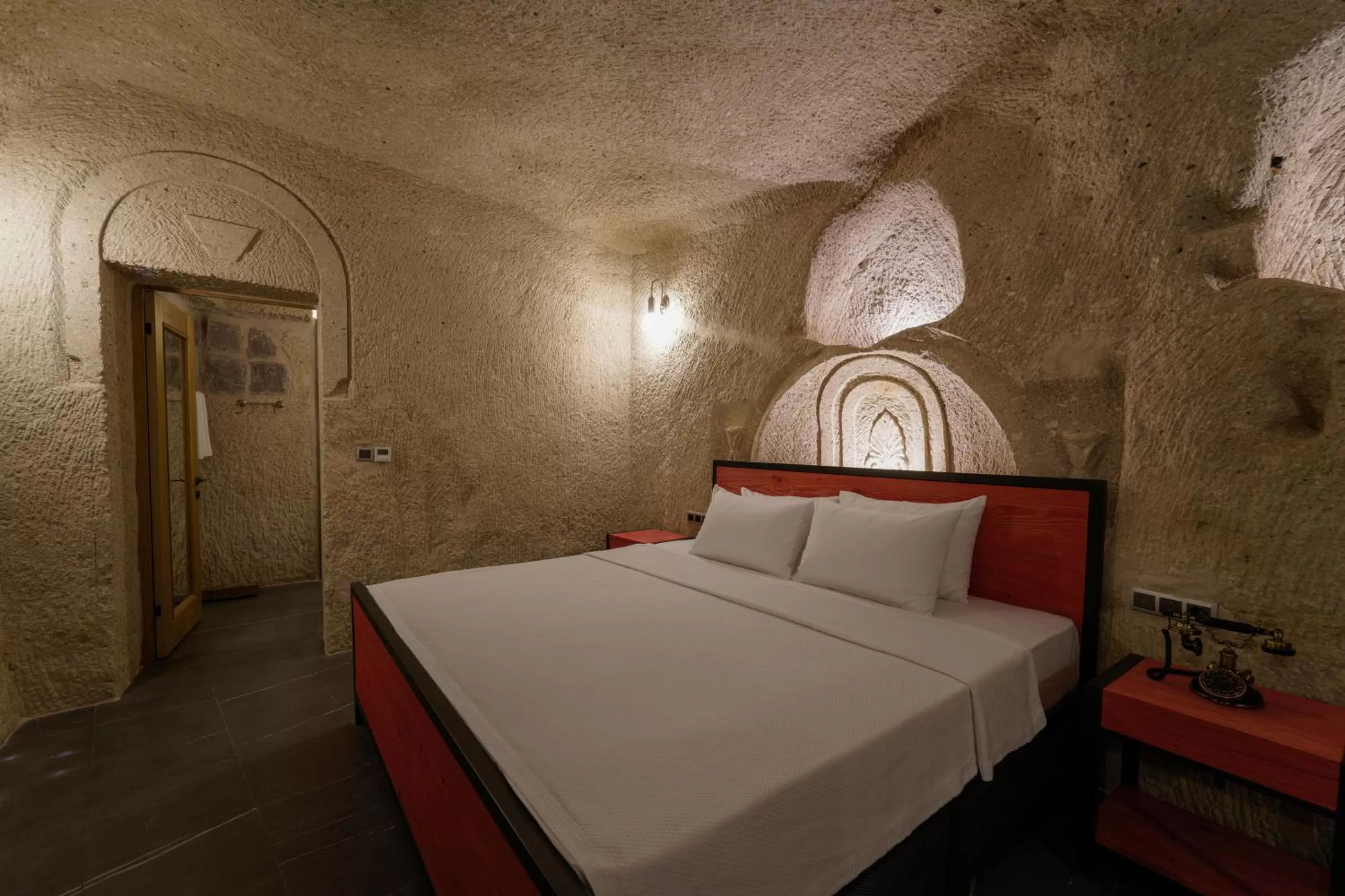 Bed in The Niche Cave Hotel
