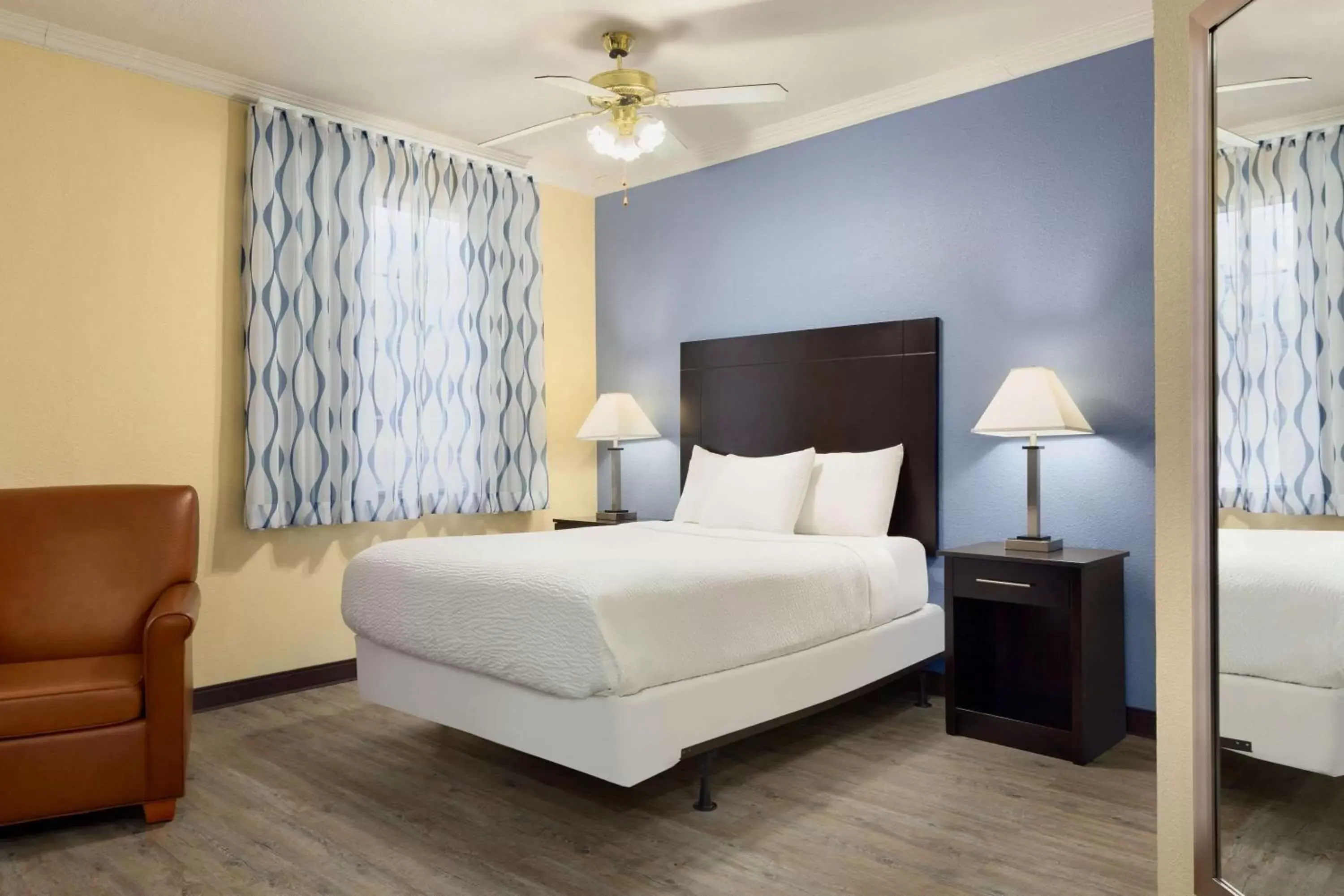 Photo of the whole room in Days Inn & Suites by Wyndham DFW Airport South-Euless