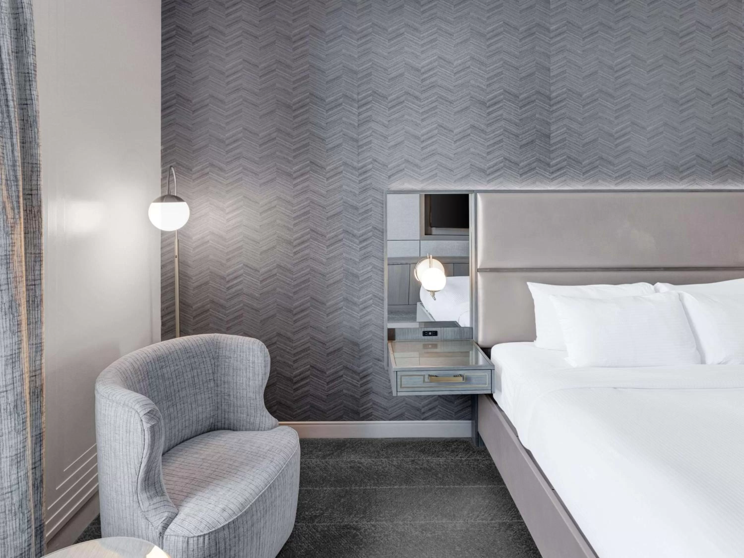 Bed in Tulsa Club Hotel Curio Collection By Hilton