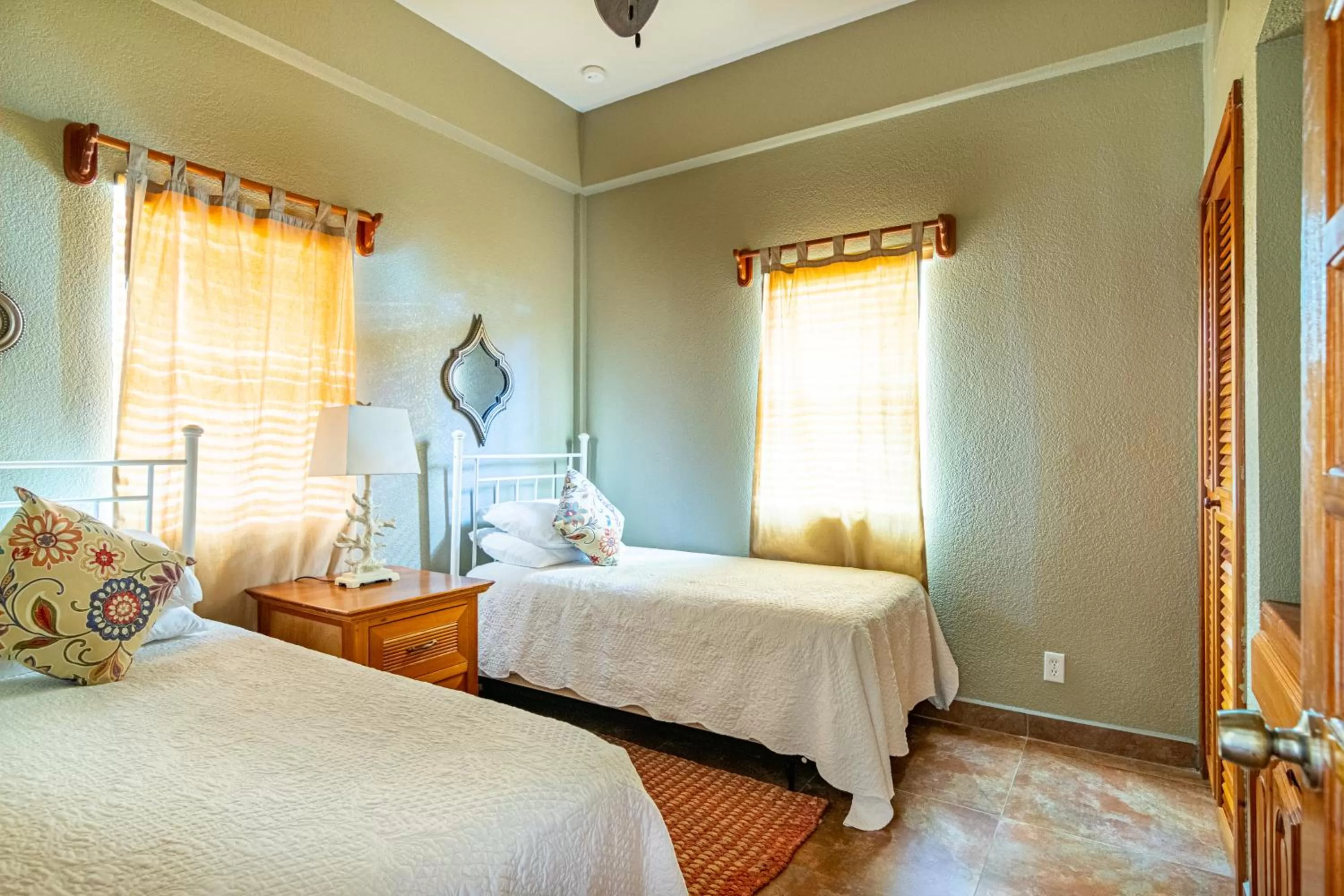 Bed in Lighthouse Beach Villas