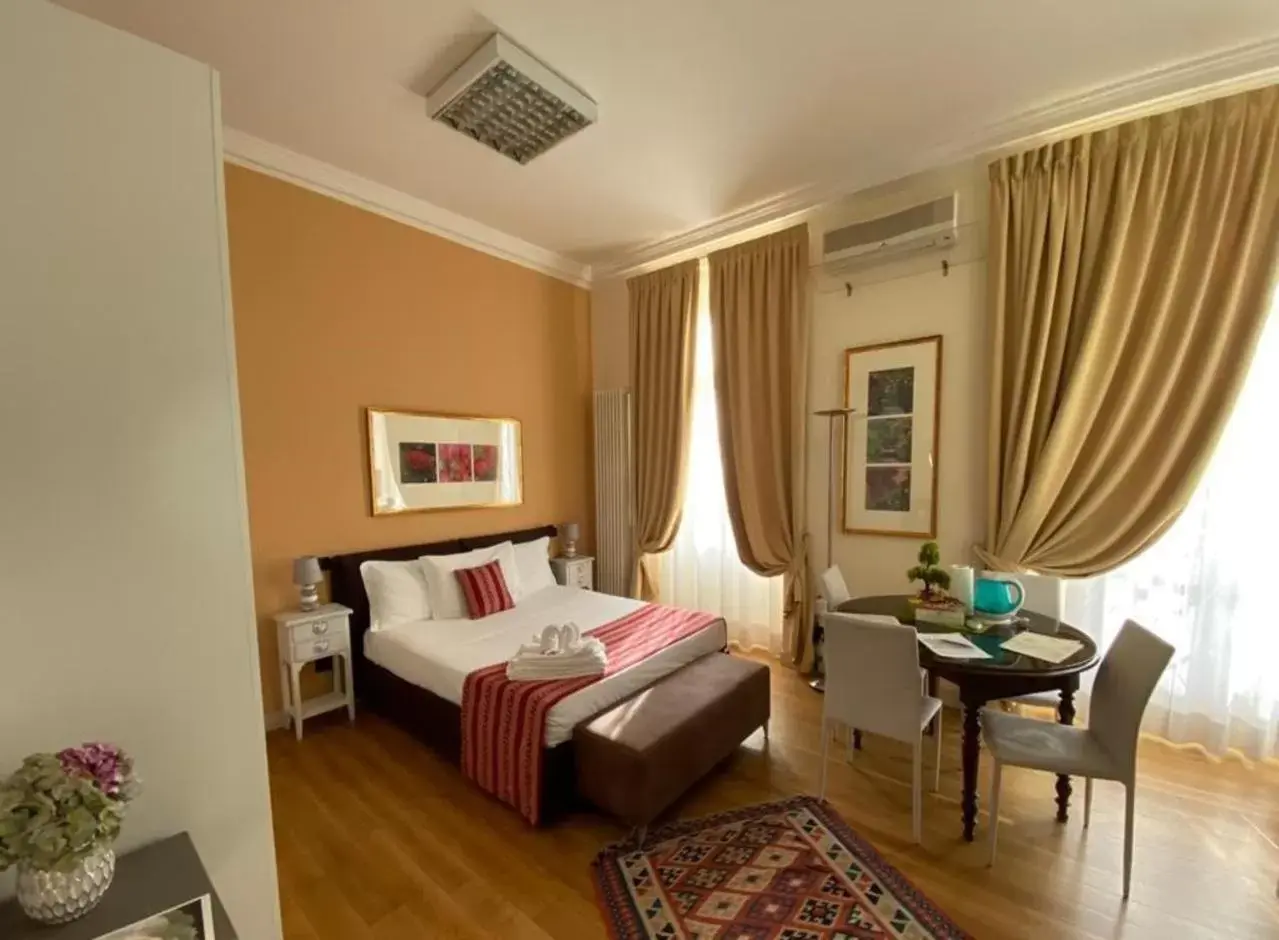 Bedroom in Loger Confort Residence & Apartments