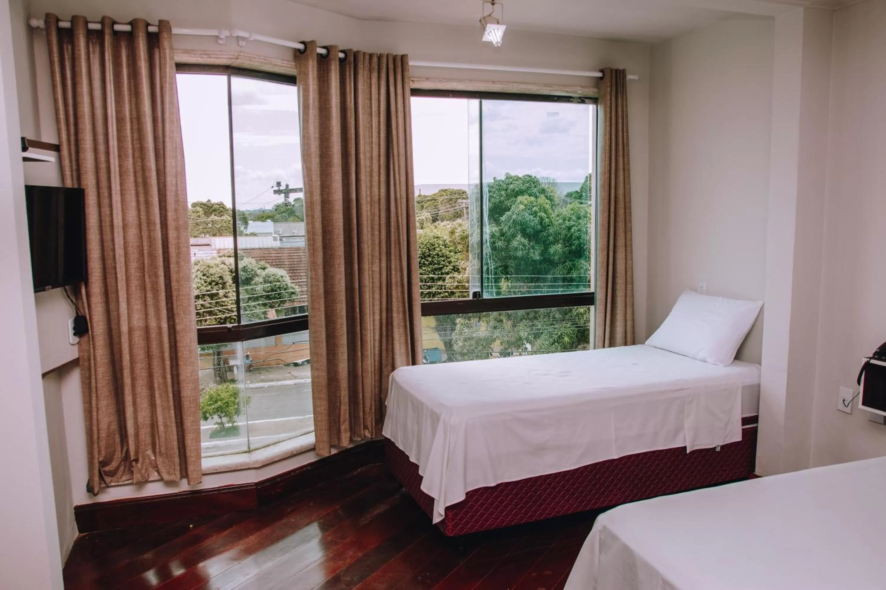 Bed in SAMIR HOTEL COMFORT