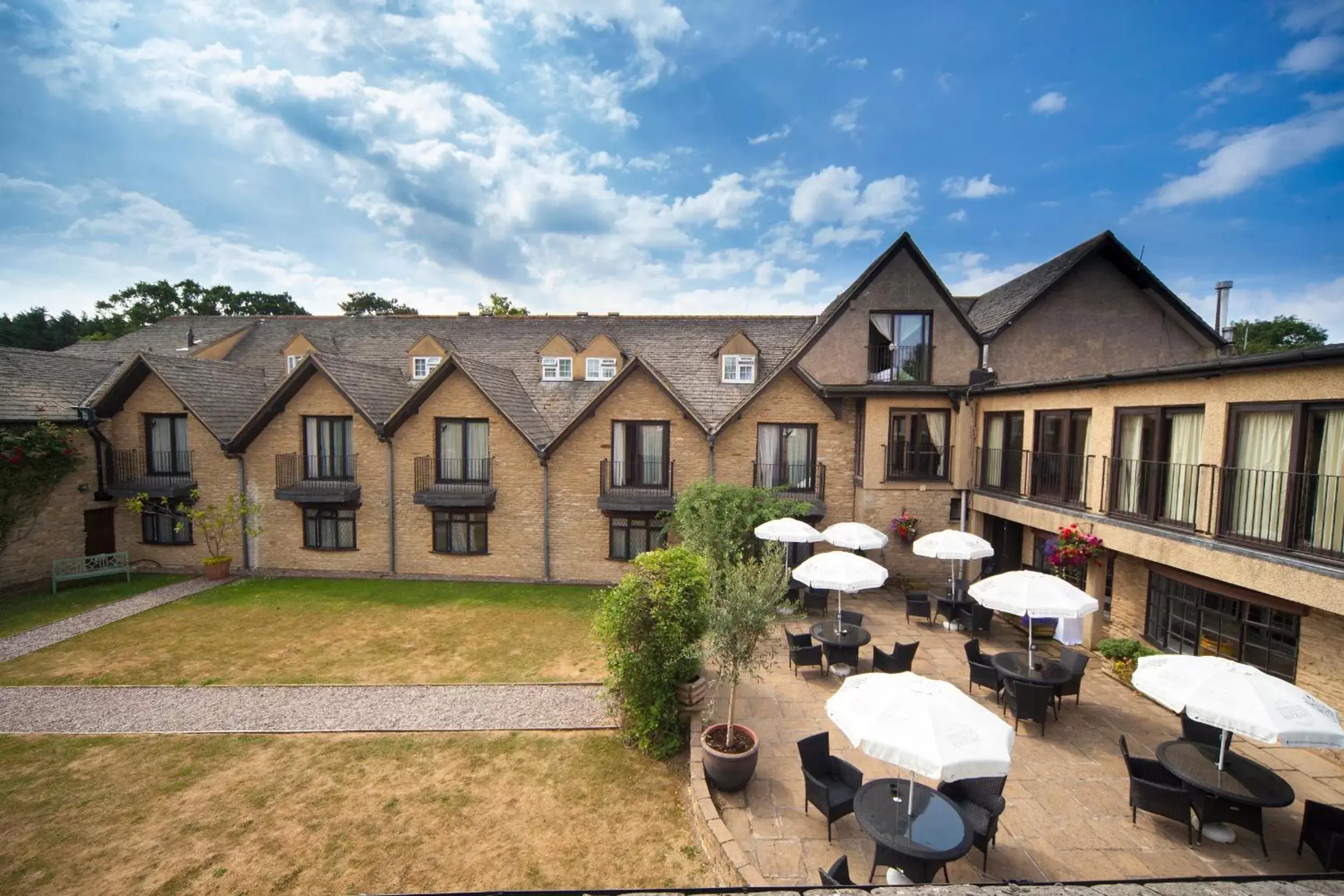 Garden, Property Building in The Holt Hotel