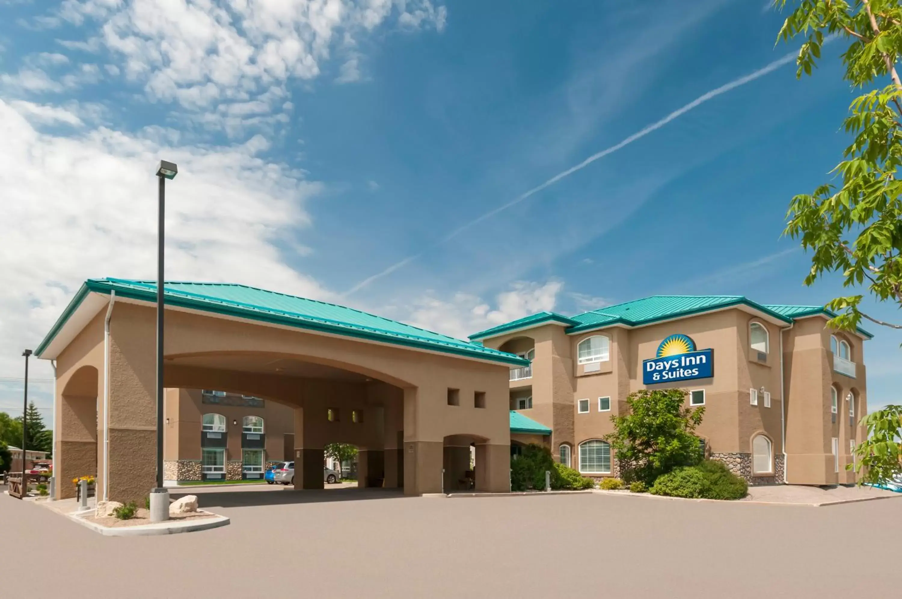 Facade/entrance, Property Building in Days Inn & Suites by Wyndham Brandon