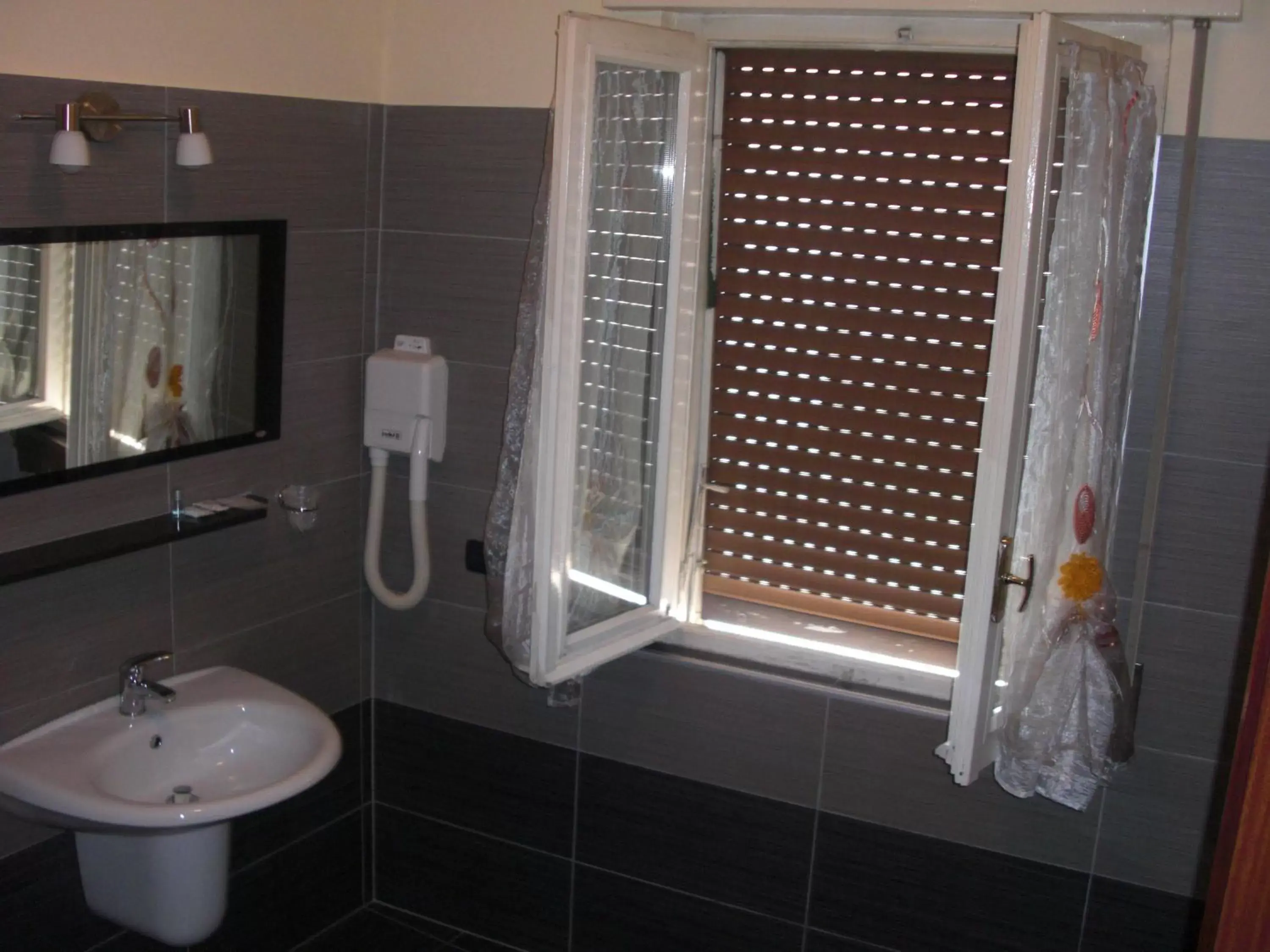 Shower, Bathroom in Hotel Legnano