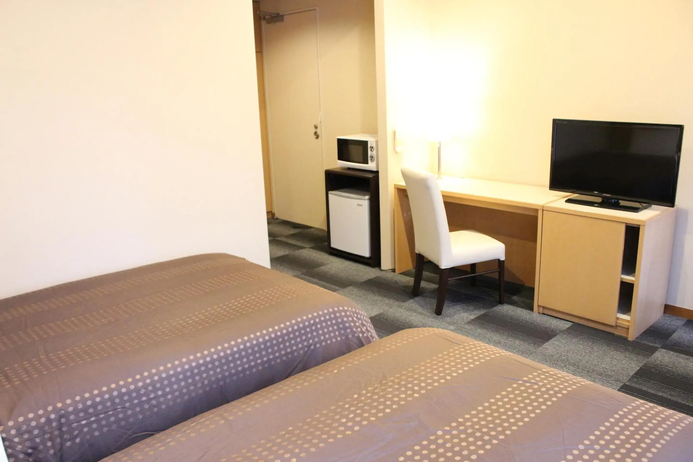 Bed, TV/Entertainment Center in Hotel Livemax BUDGET Chibamihama