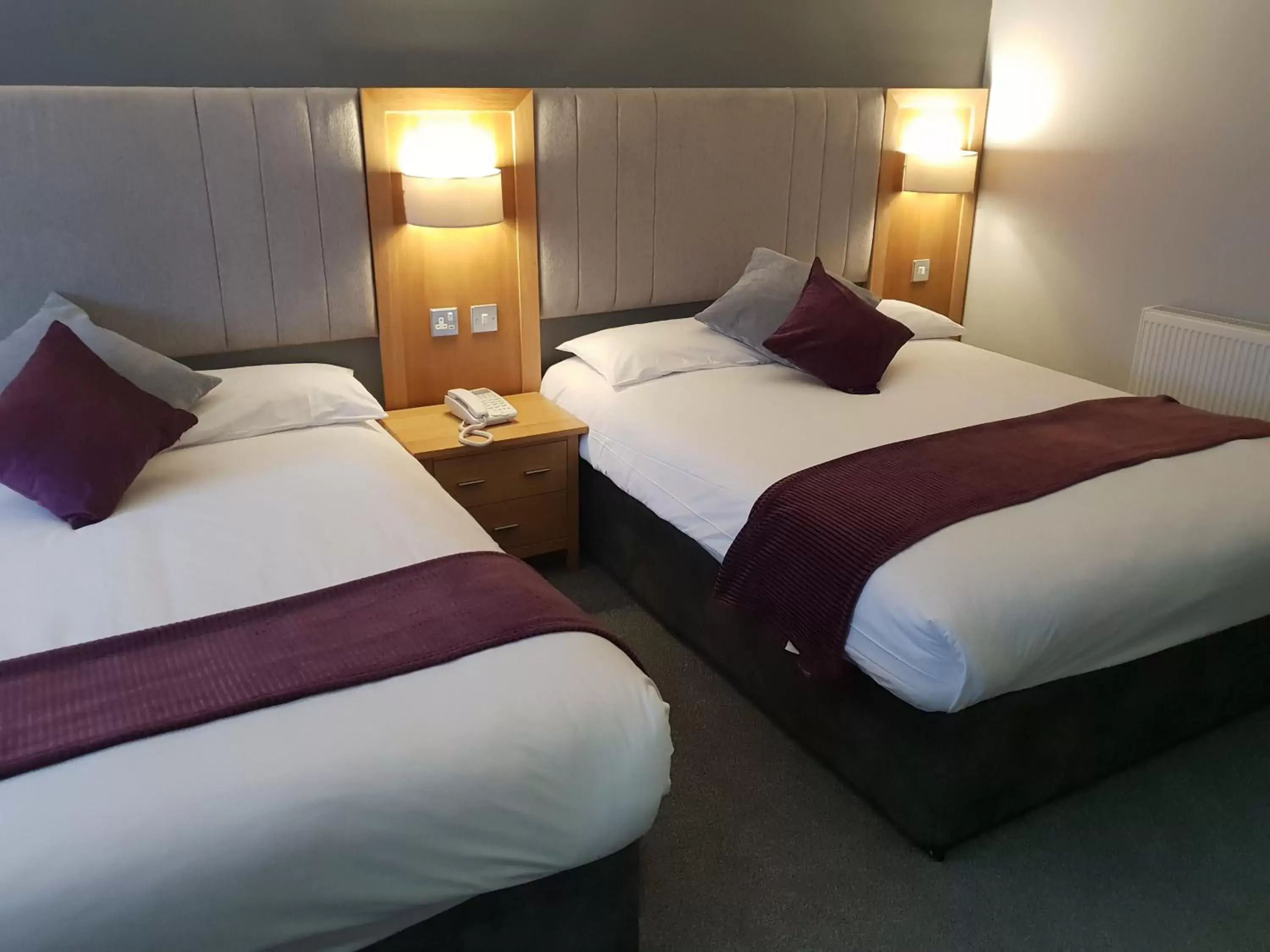 Bed in The Diplomat Hotel Restaurant & Spa Bed in The Diplomat Hotel Restaurant & Spa