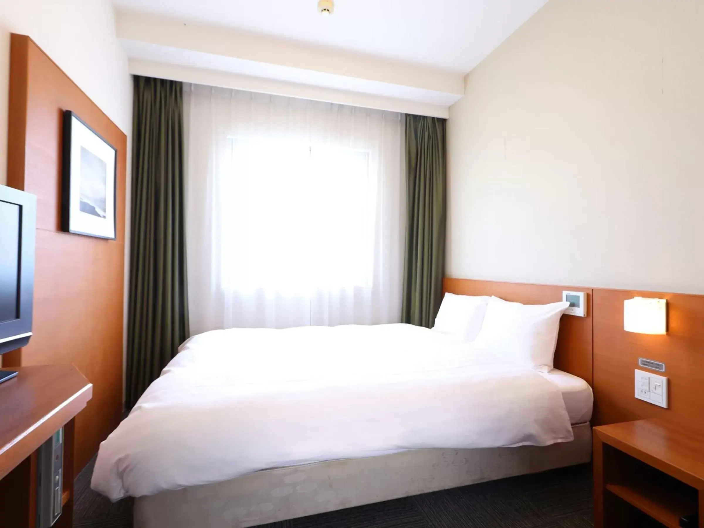 Bed in Dormy Inn Takasaki