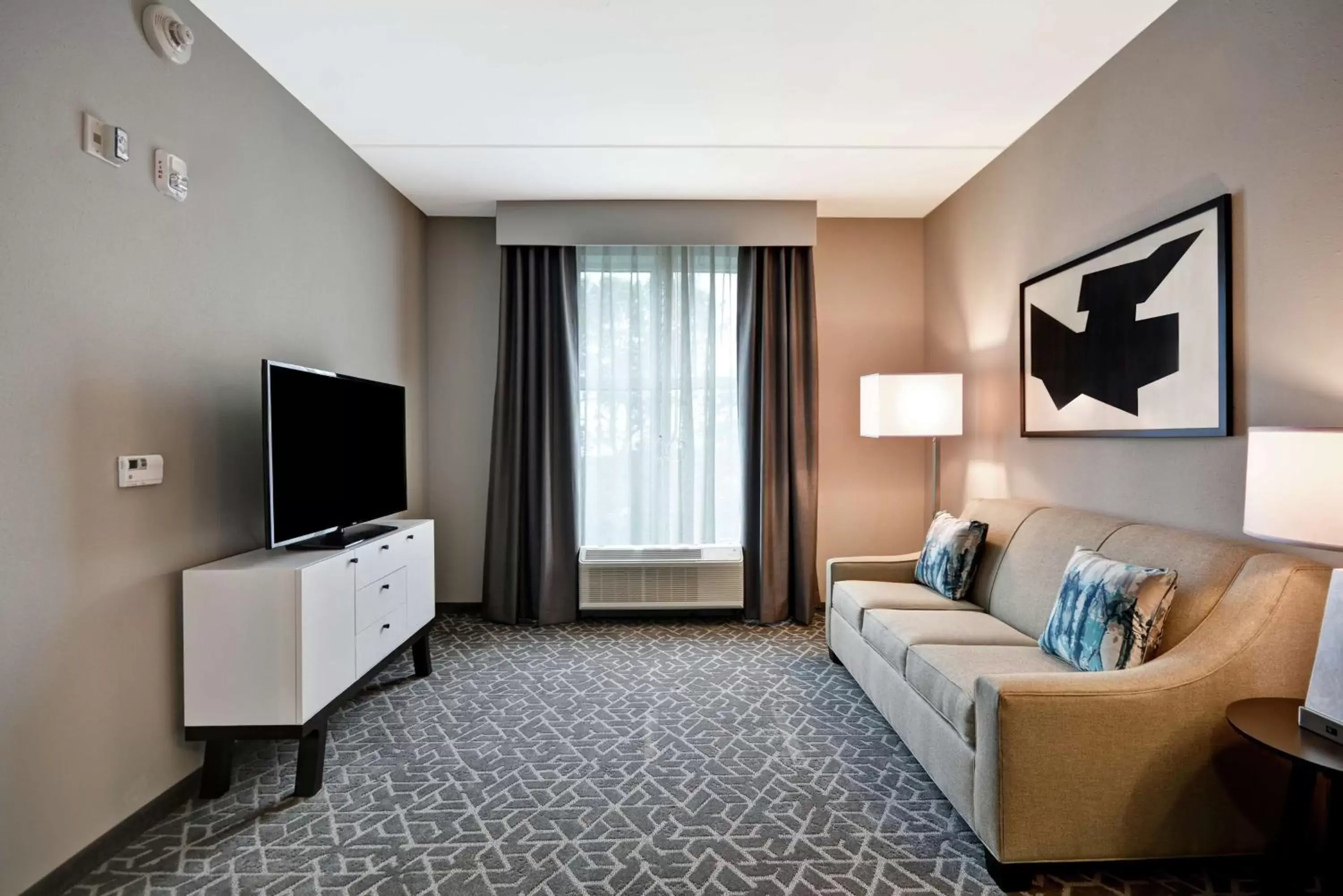 Living room, TV/Entertainment Center in Homewood Suites by Hilton Raleigh Cary I-40
