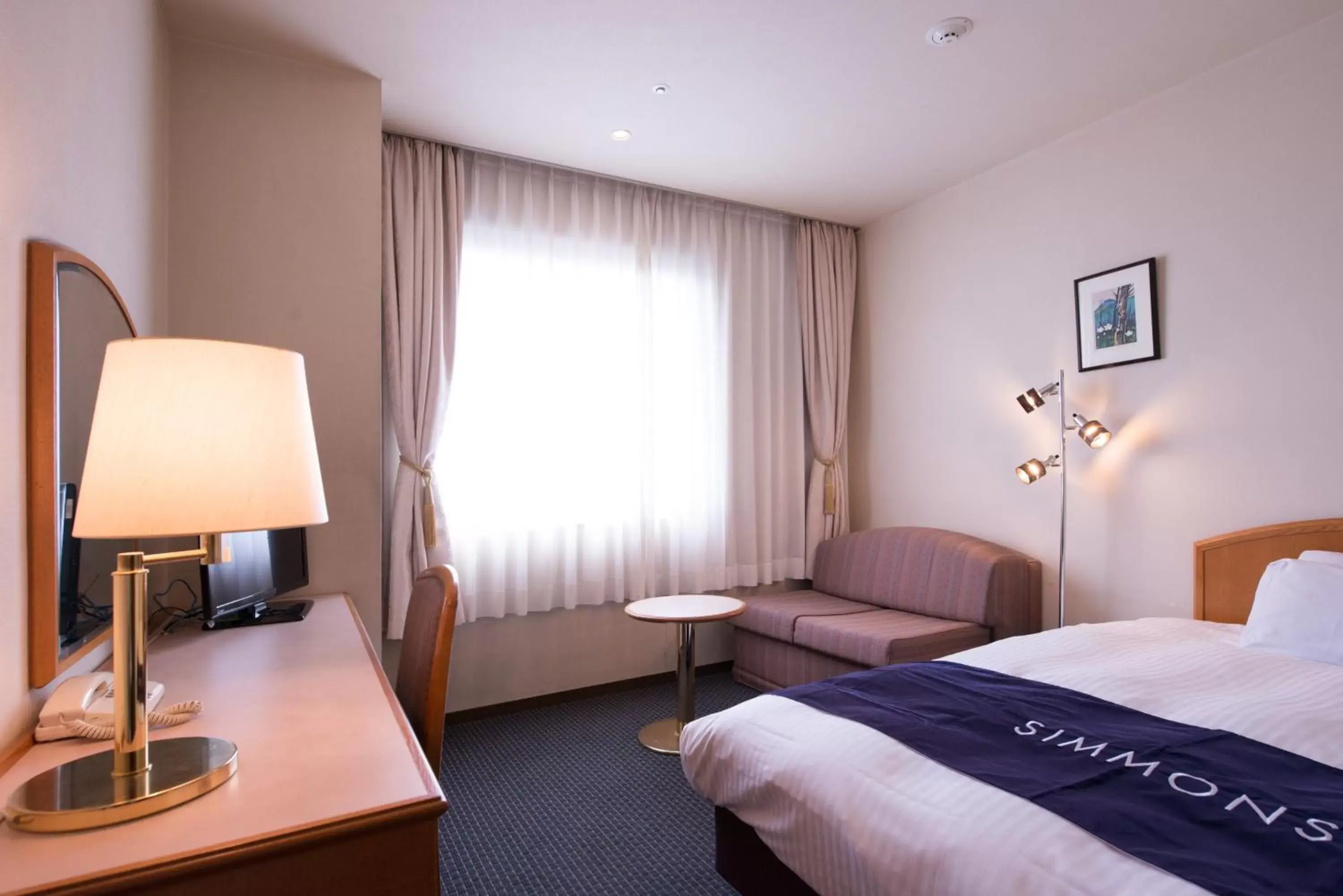 Bed in Hotel Kumamoto Terrsa