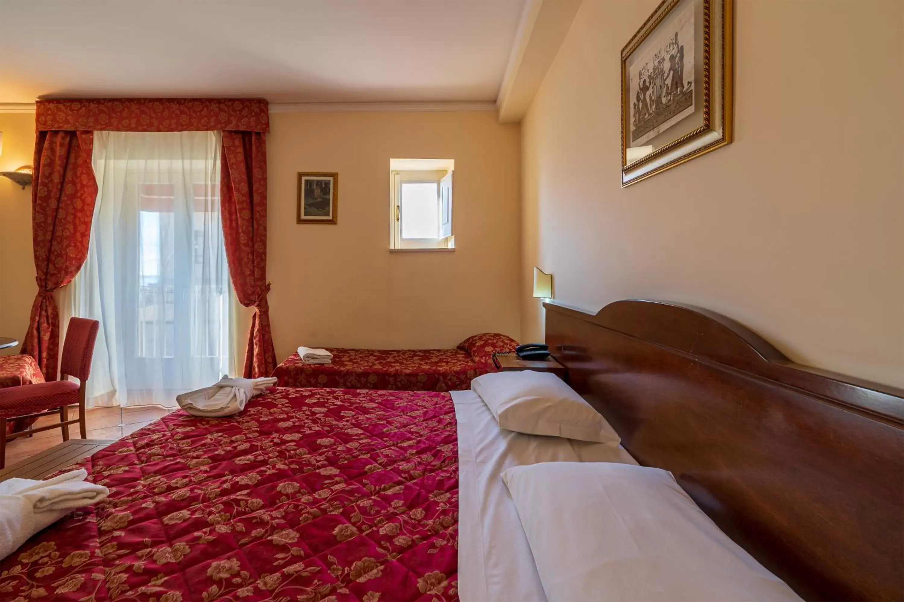 Bed in Hotel Mediterraneo