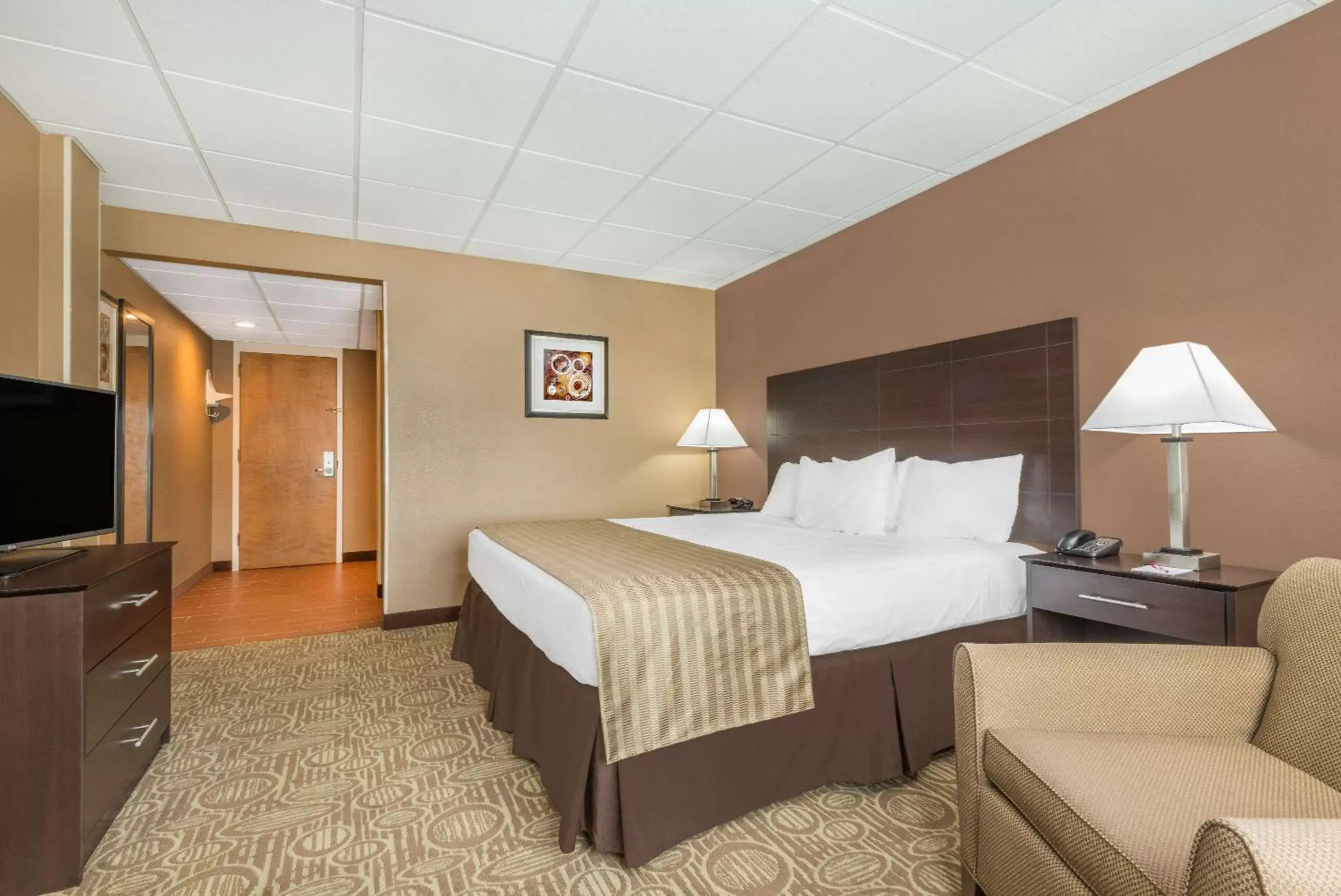 Photo of the whole room, Bed in Ramada by Wyndham Paintsville Hotel & Conference Center