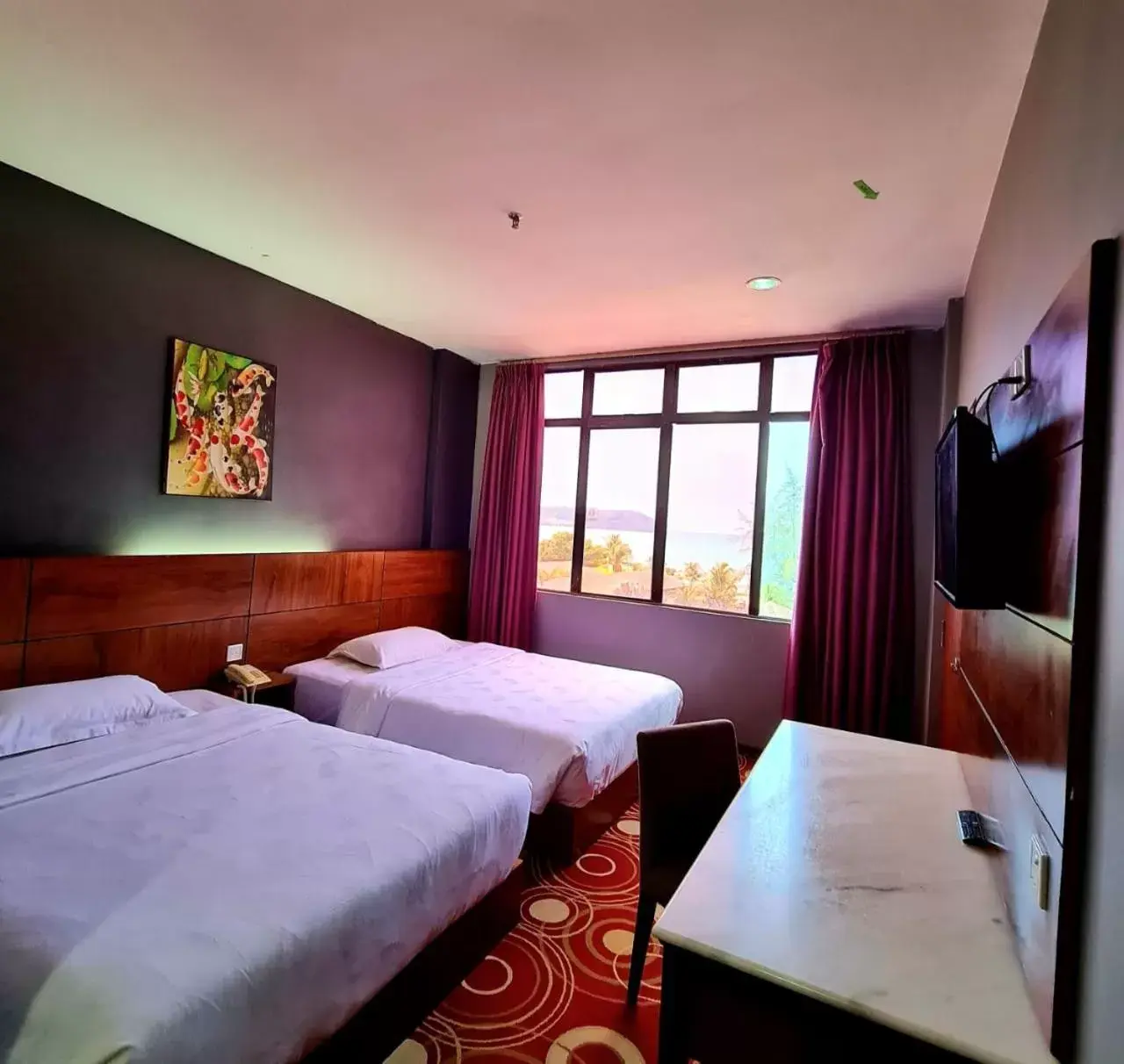 Bed in Langgura Baron Resort
