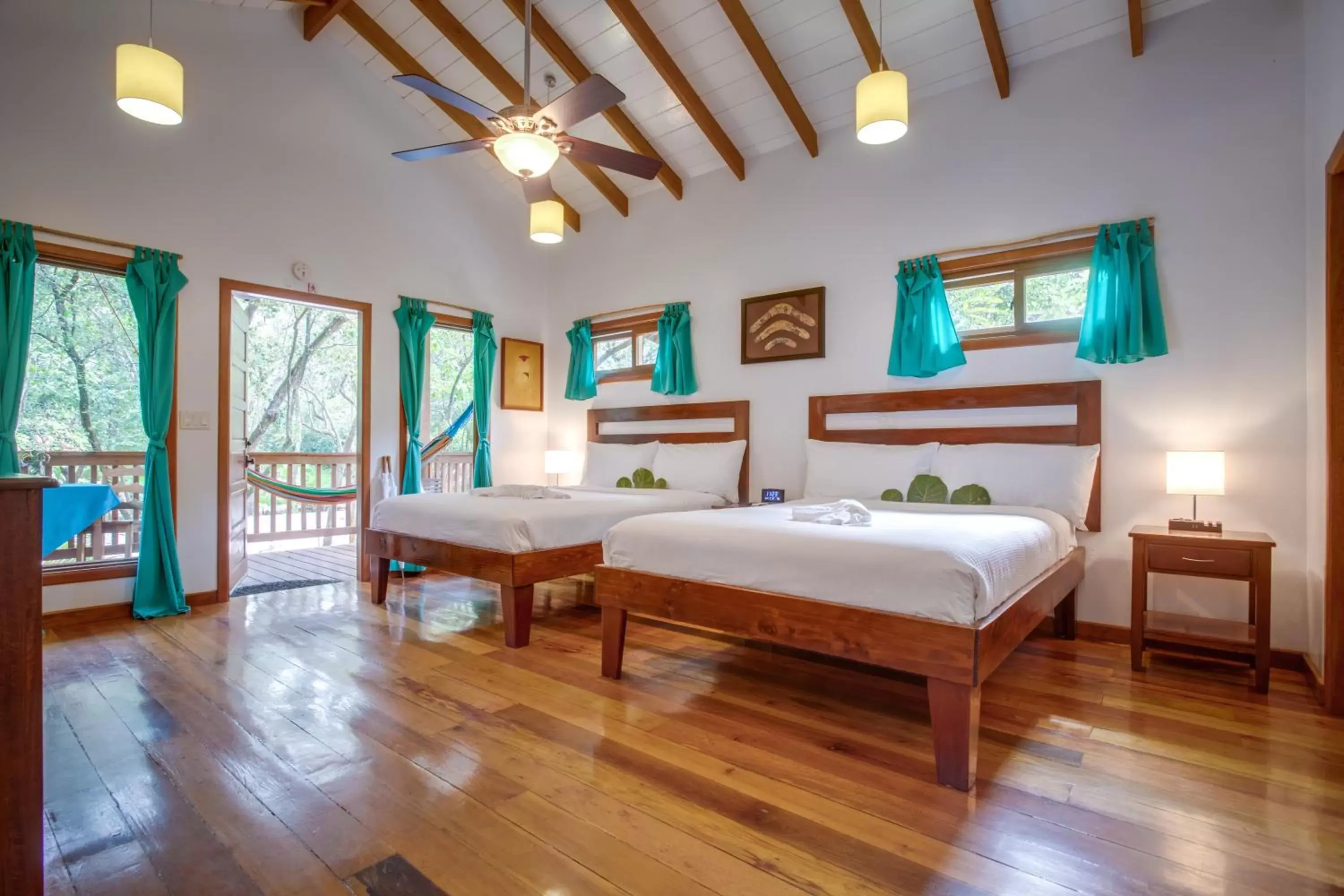 Bed in Mariposa Belize Beach Resort