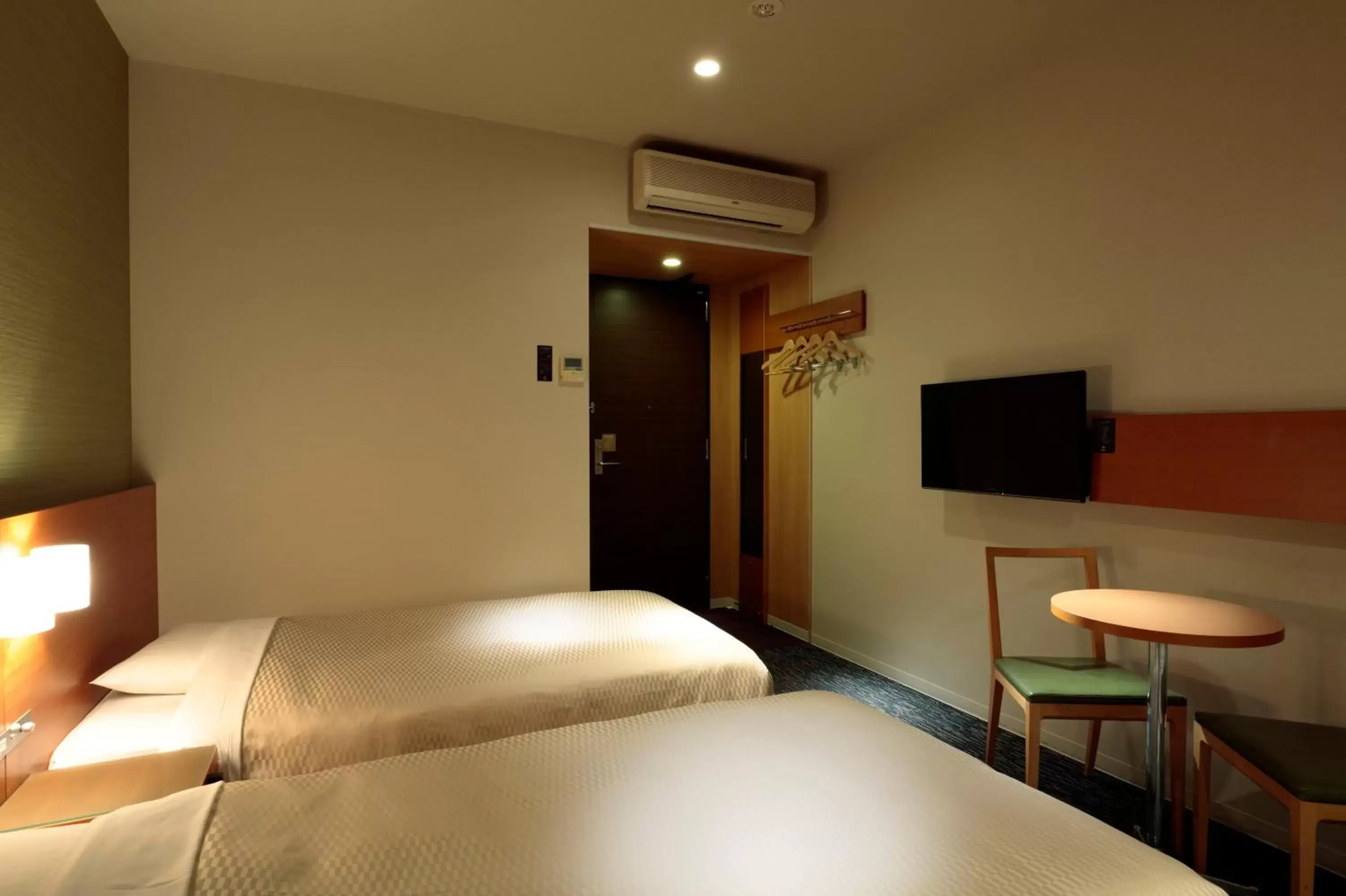 Bed in Candeo Hotels Fukuyama