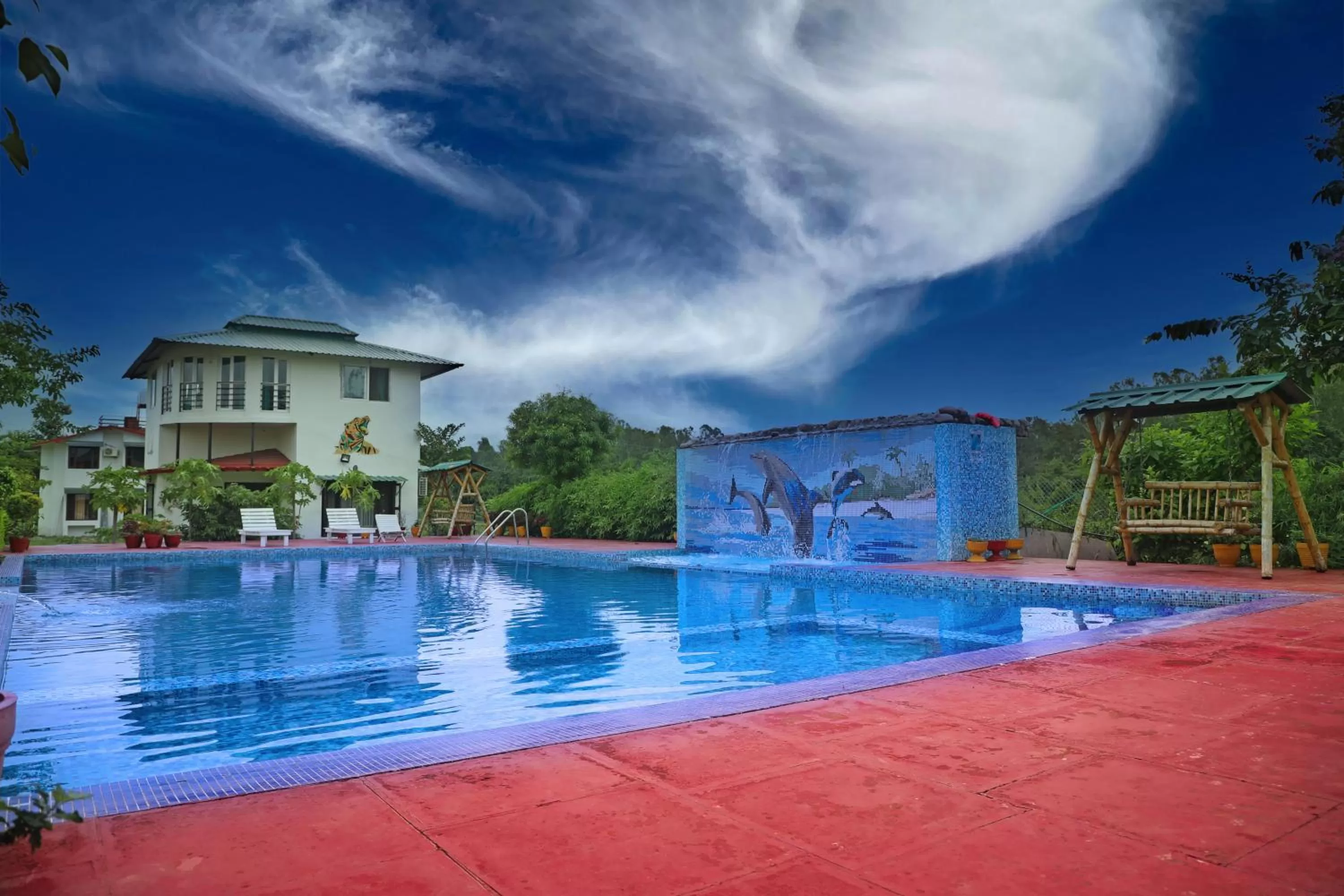 Swimming pool in Corbett Treat Resort By Atya Hotels