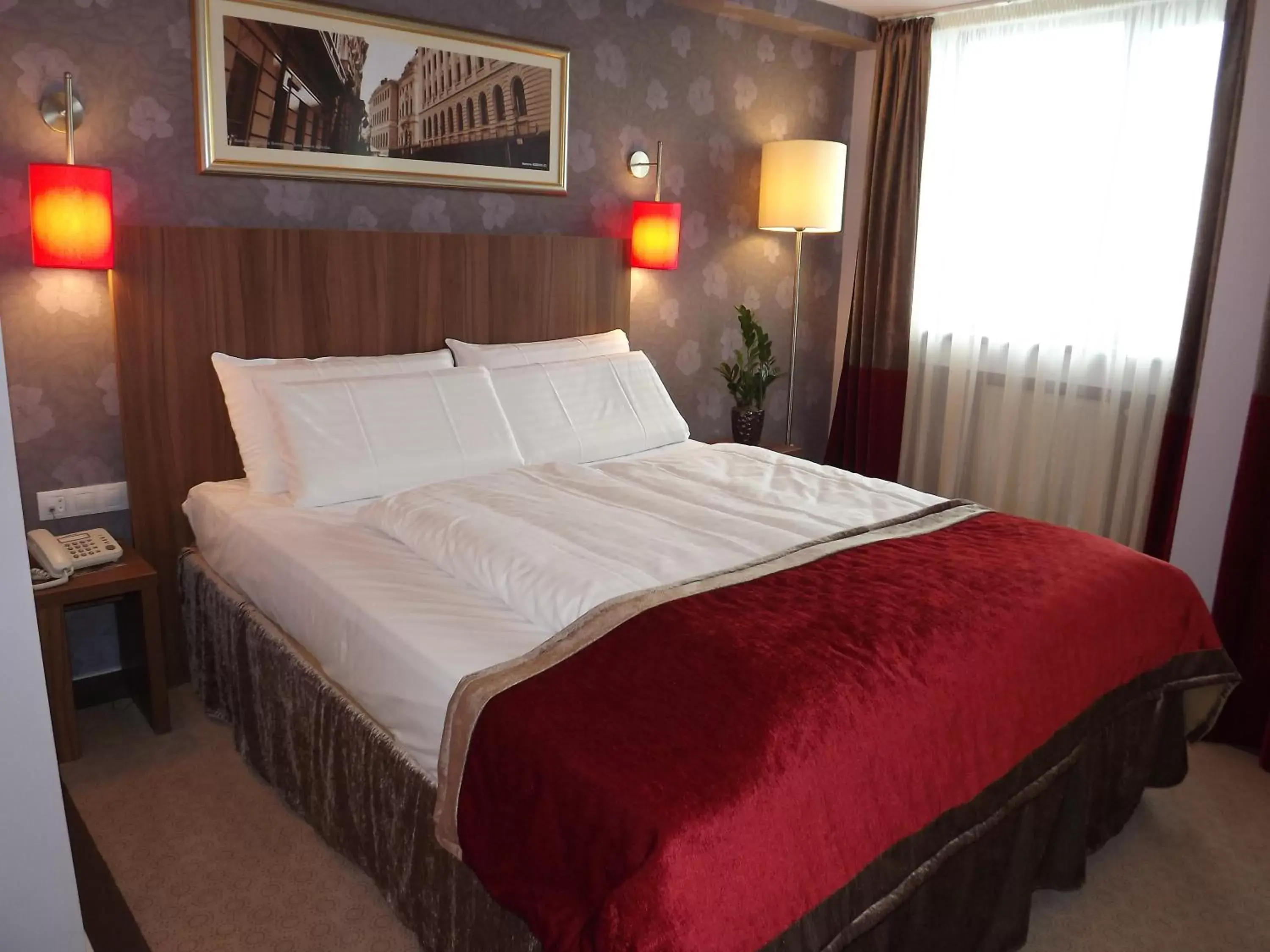 Bed in Hotel Ambasador